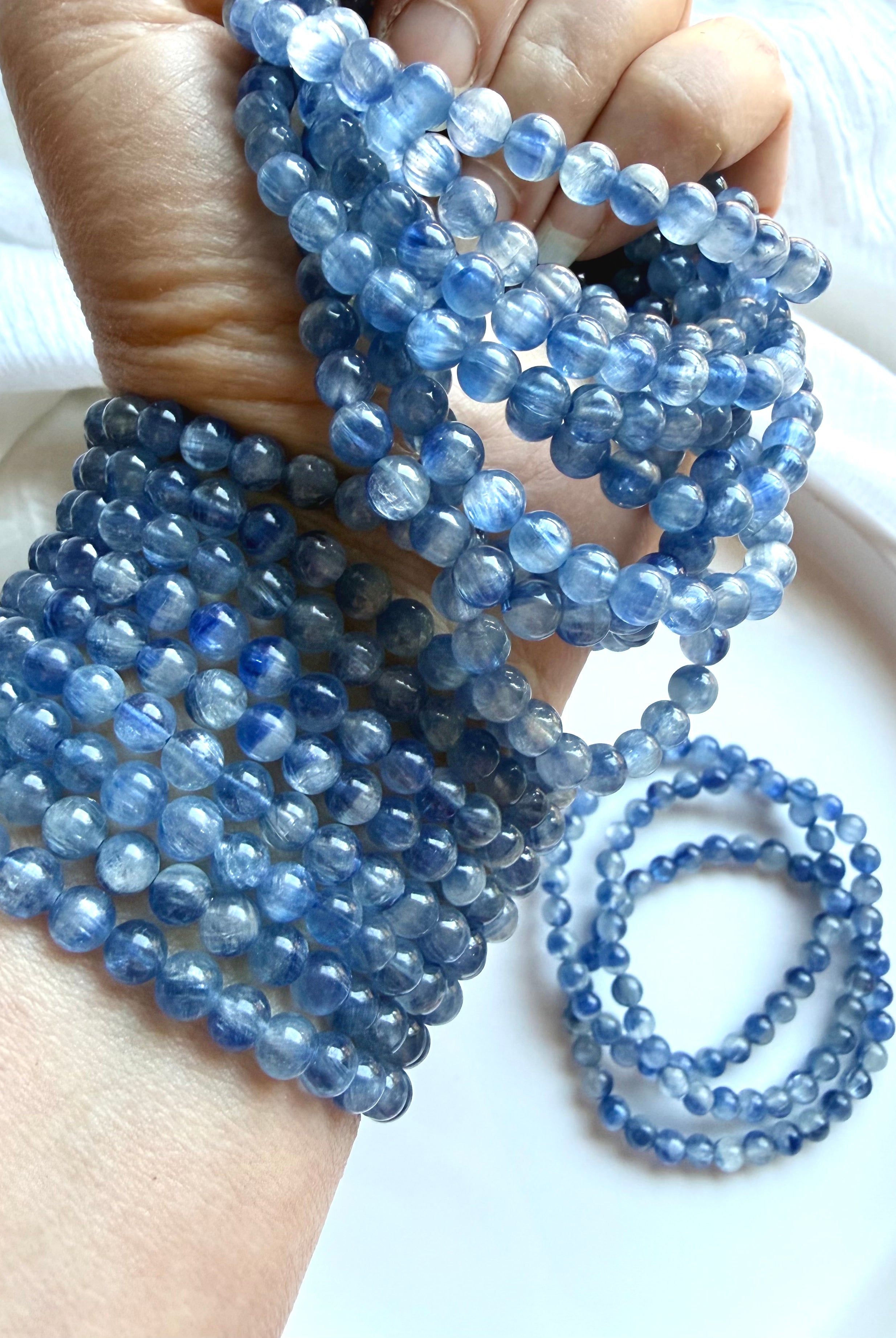 Blue Kyanite beaded bracelet with luminous layered blue gemstones and natural color variation