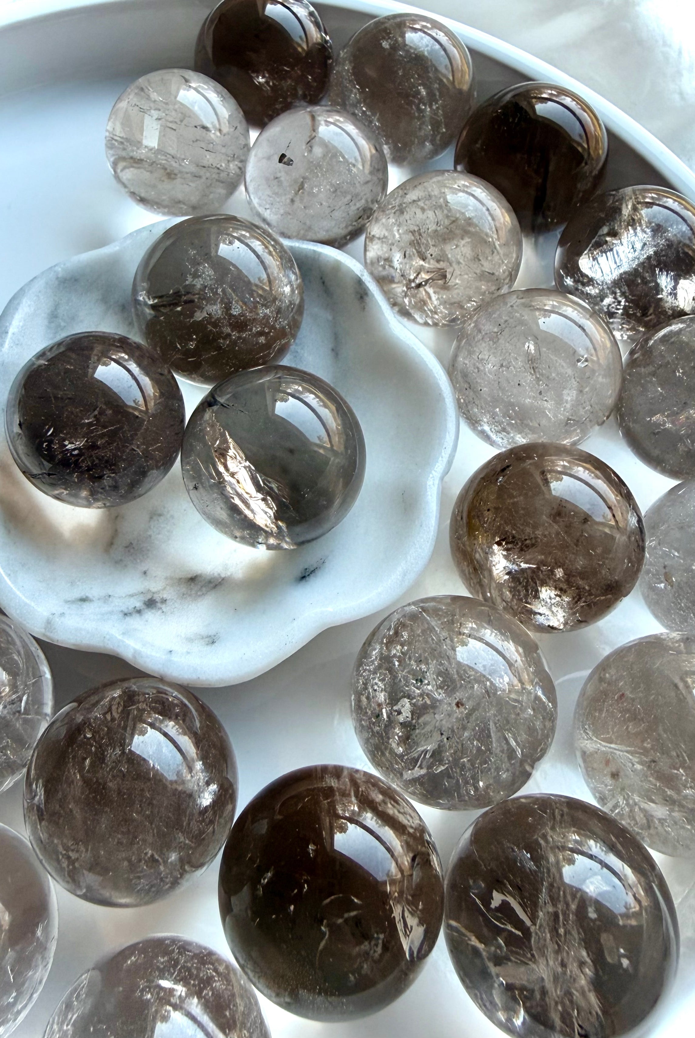 Smoky Quartz mini spheres with translucent grounding crystal tones and polished glossy finish