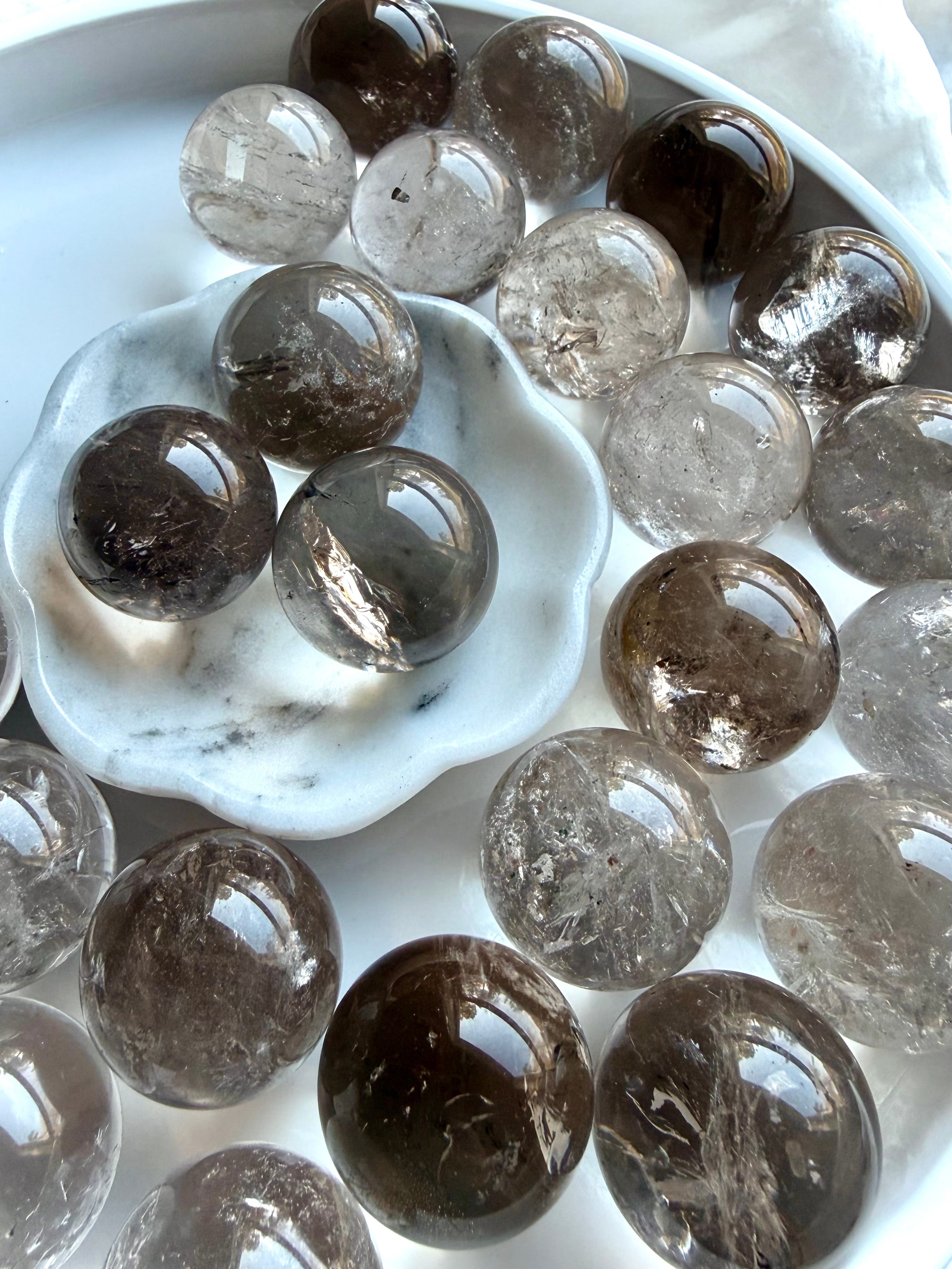Smoky Quartz mini spheres with translucent grounding crystal tones and polished glossy finish