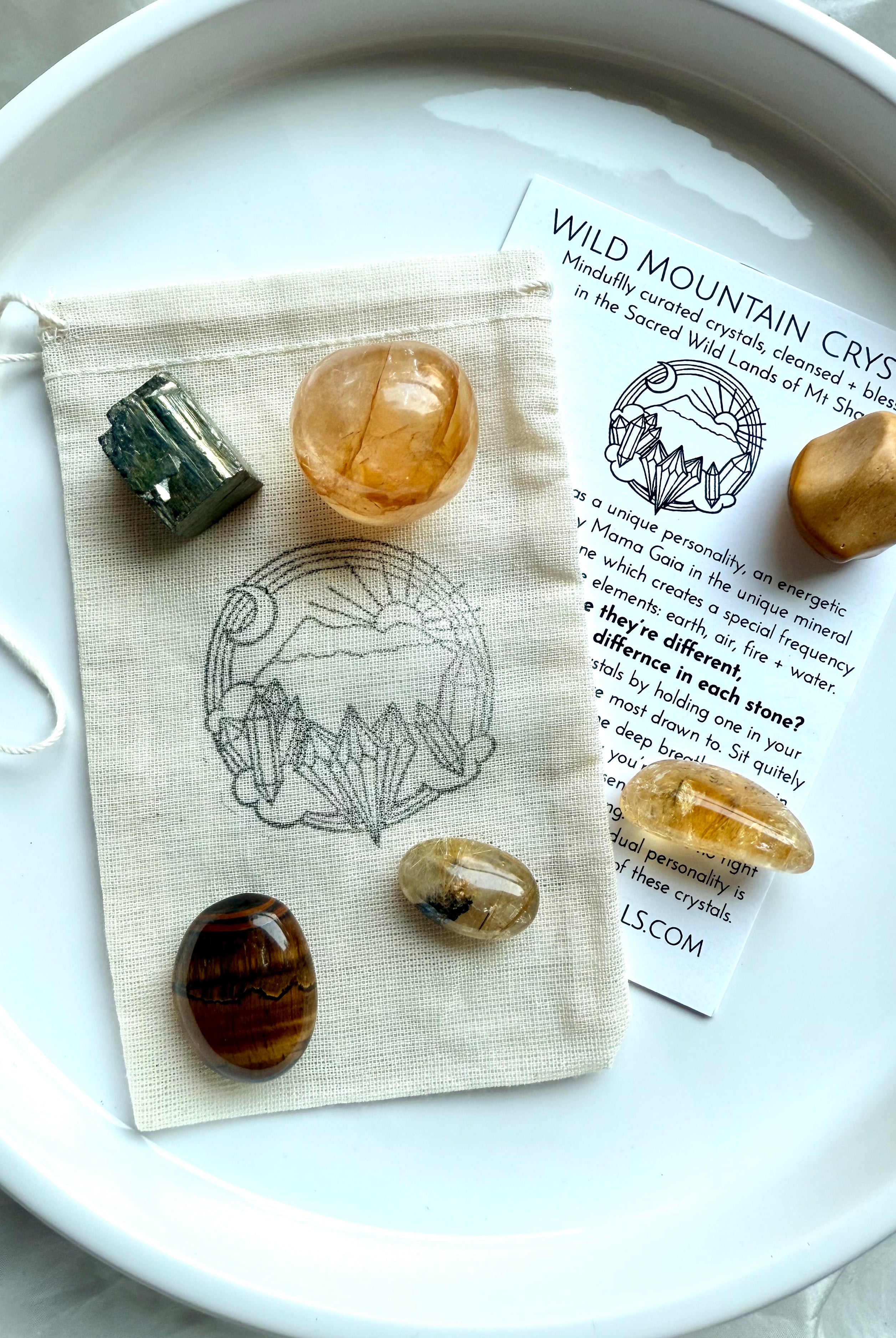 Solar Plexus Chakra set with golden healer, citrine, golden rutile, tiger’s eye, yellow mookaite, and raw pyrite on cotton pouch with info card