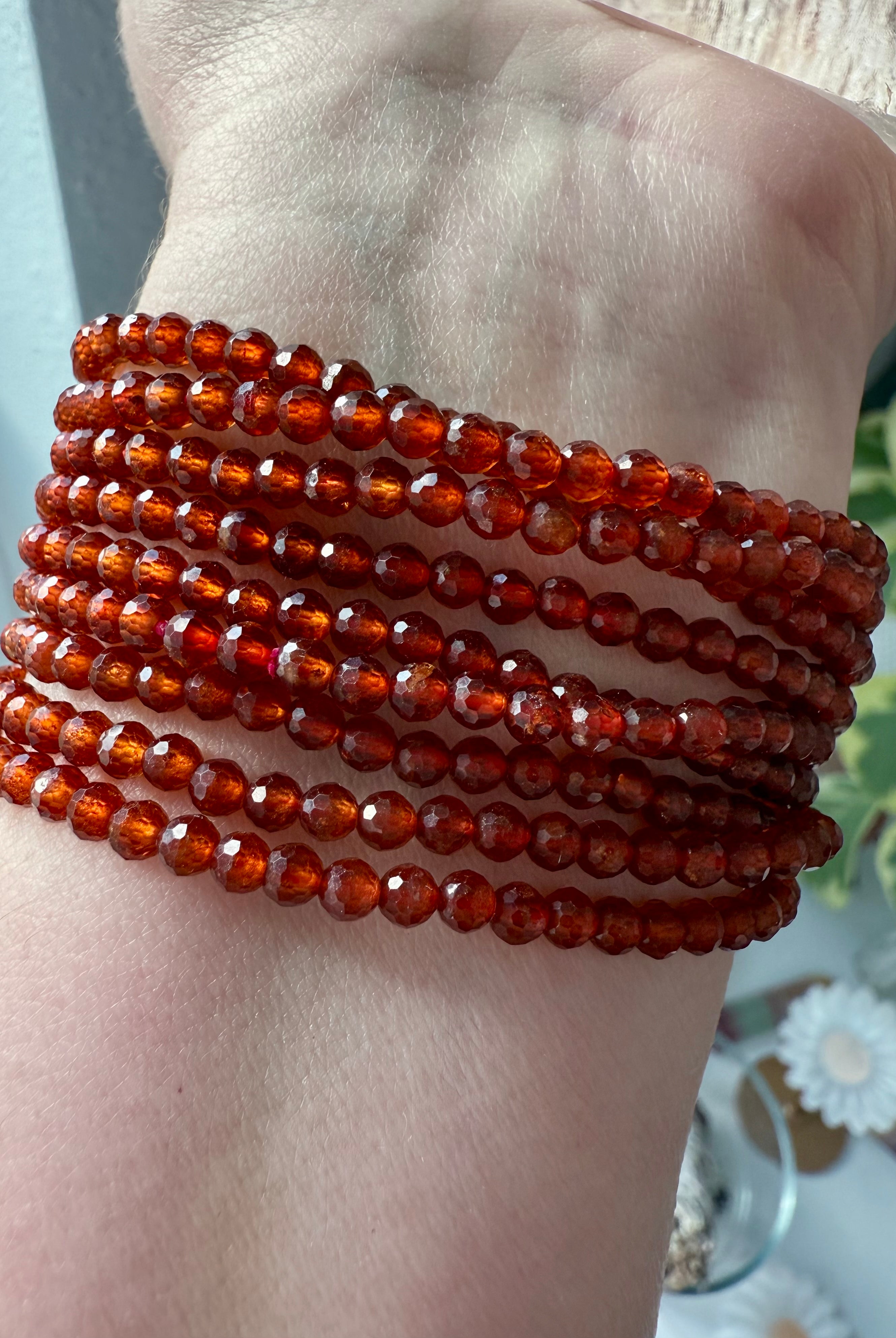 A sparkly faceted Spessartite Garnet Bracelet with lovely depth of color + gemmy transparency