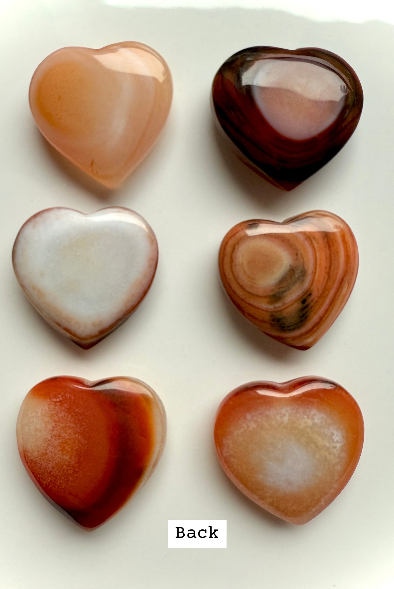 Back view of Mini Carnelian Heart revealing natural banding and unique stone patterns