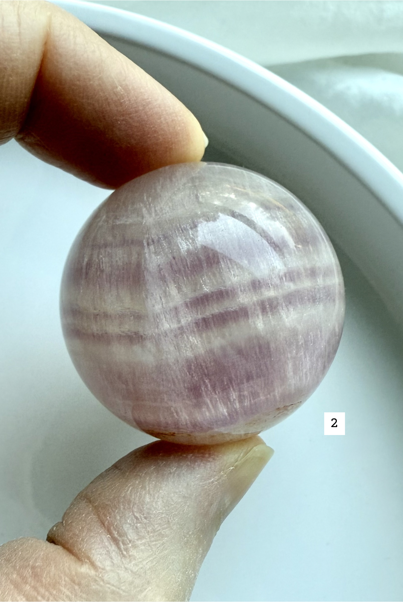 choose your own pink Fluorite sphere with silky cream and lavender striping for emotional balance and focus