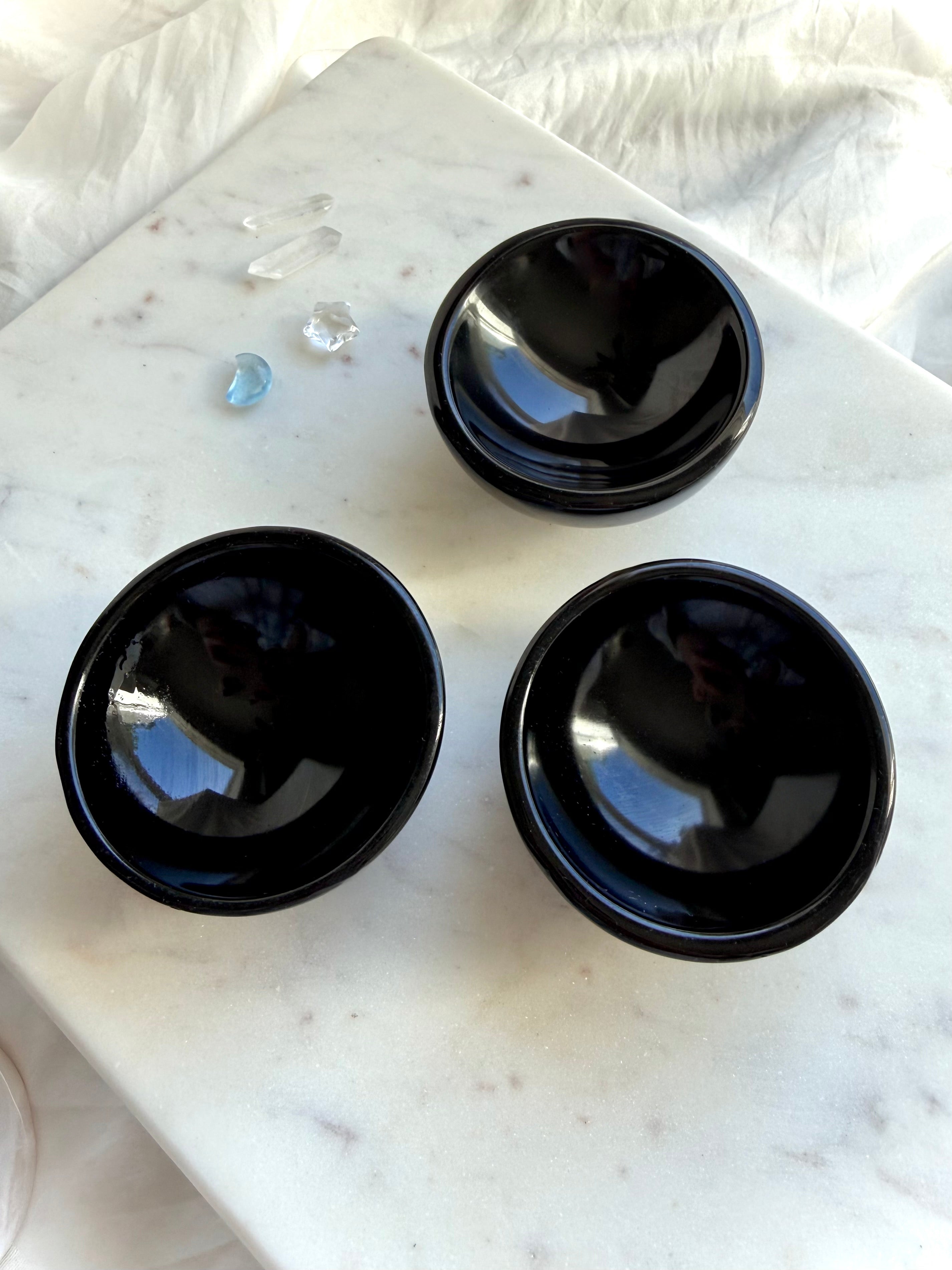 Black Obsidian crystal bowls shown in both available size variations