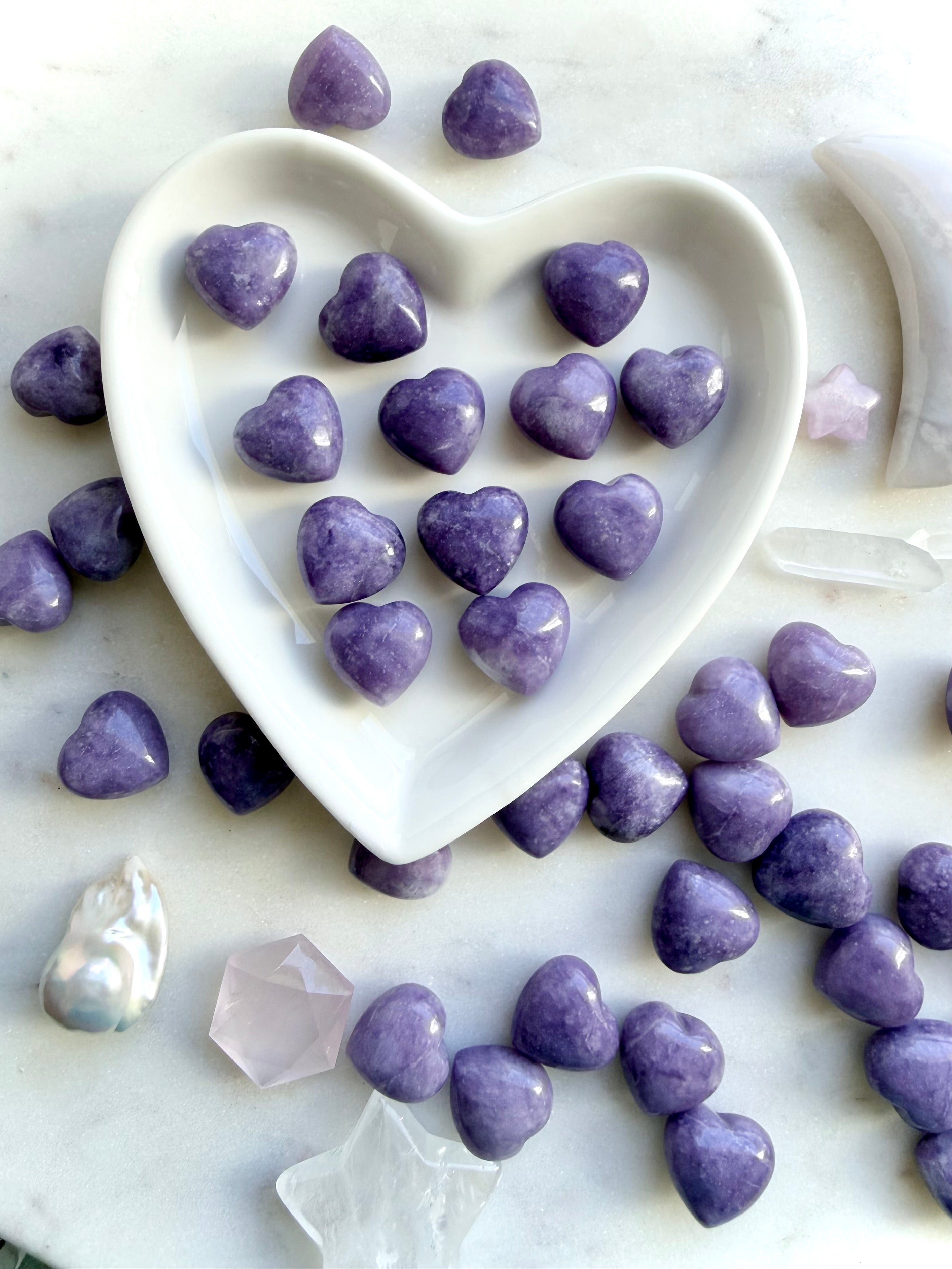 Mini Lilac Lepidolite puffy hearts in a white heart dish for peace, emotional healing, and stress relief