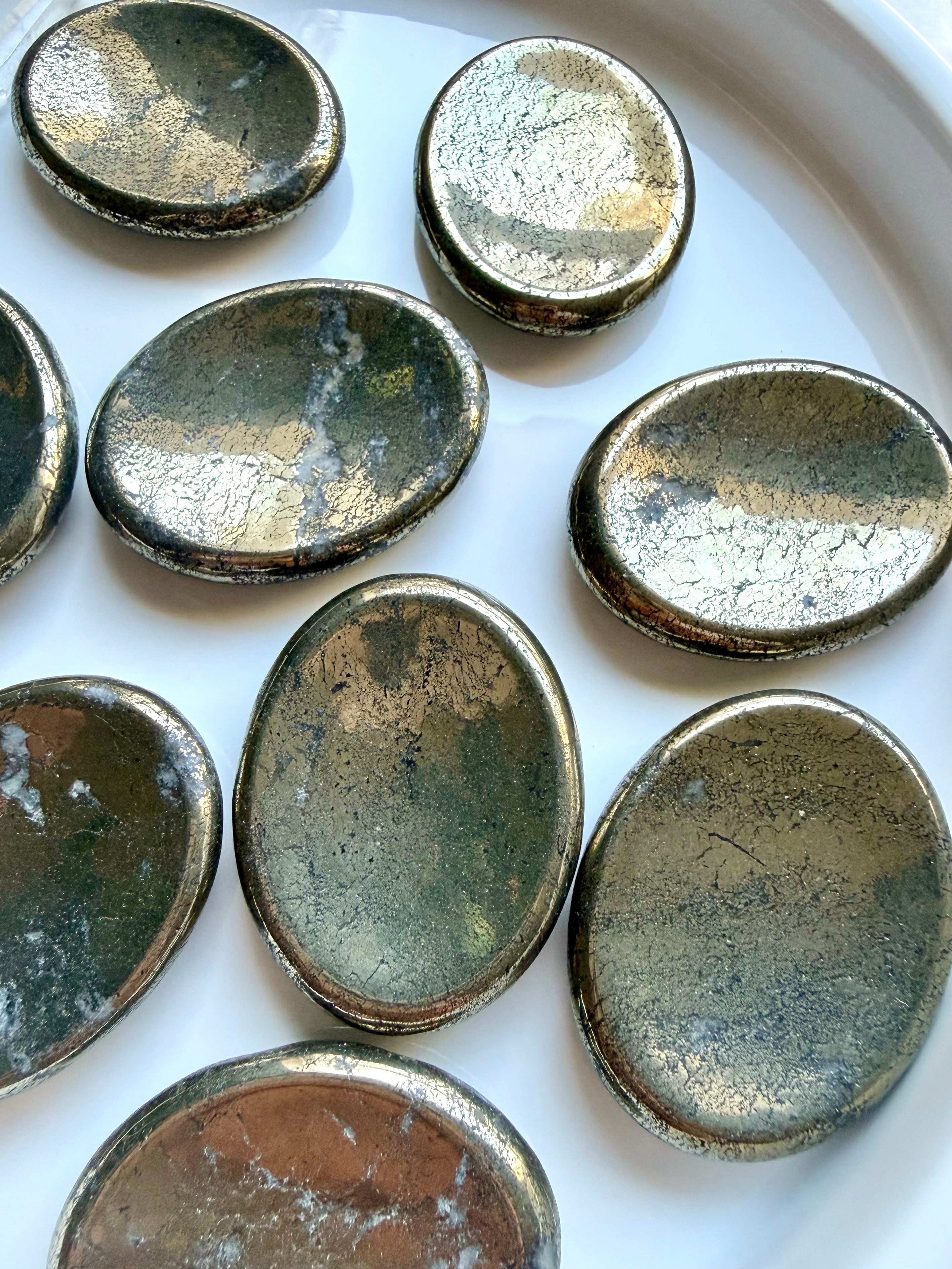 Natural Pyrite thumb stones with reflective metallic sheen and unique black and white mineral inclusions