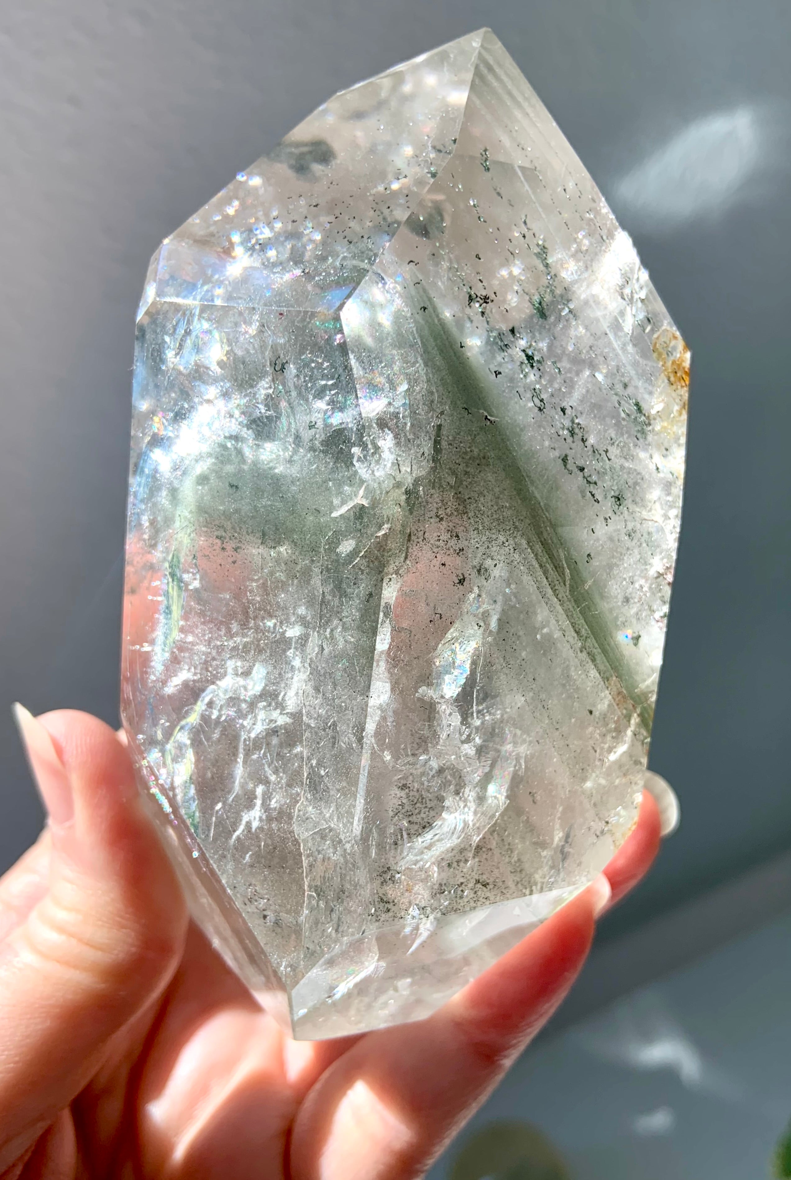 A Garden Quartz Lodolite Crystal with chlorite phantoms, mossy mineral inclusions + tons of rainbows