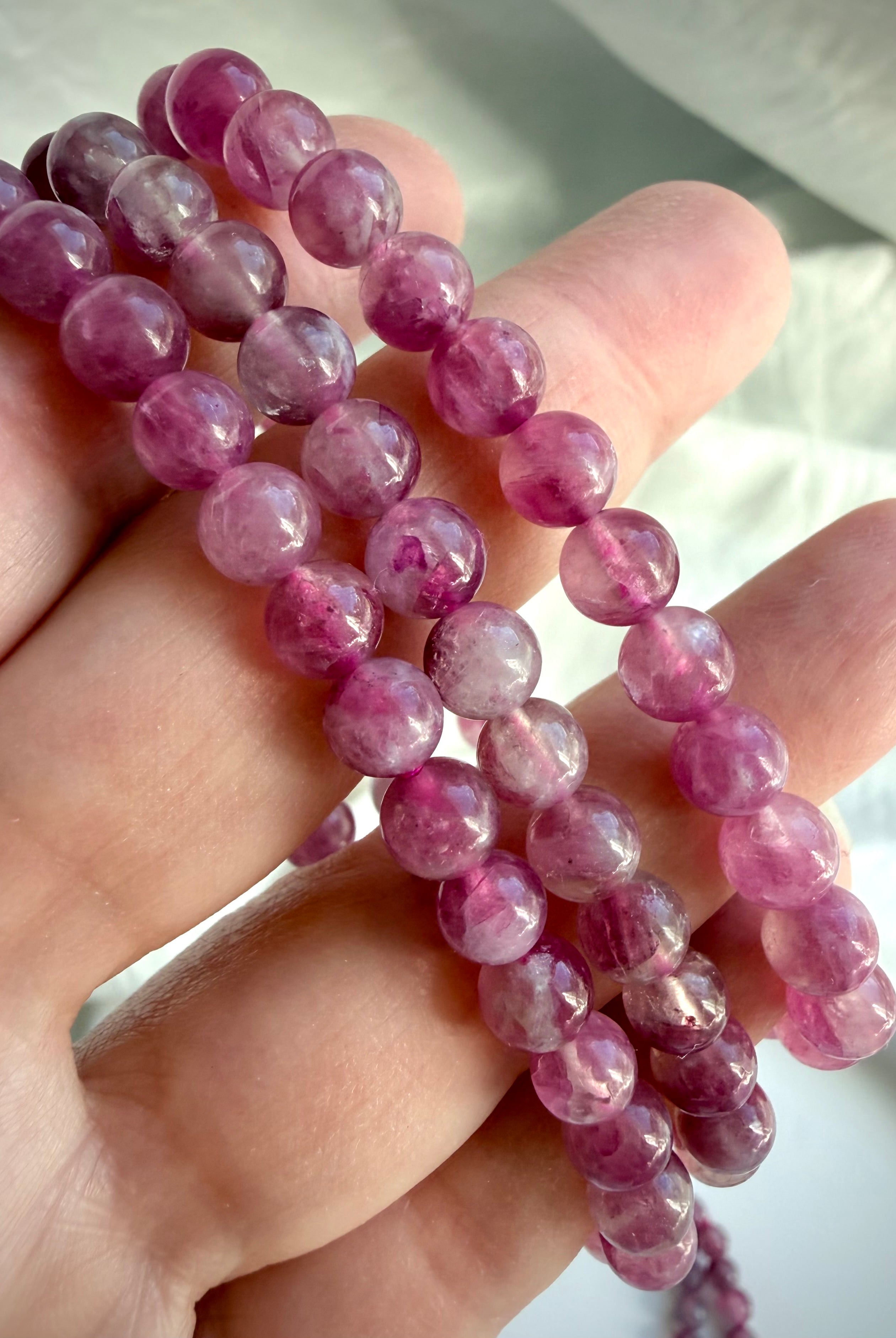 Pink Tourmaline bracelet strands displaying gemmy pink crystals with natural color variation and glowing internal dimension