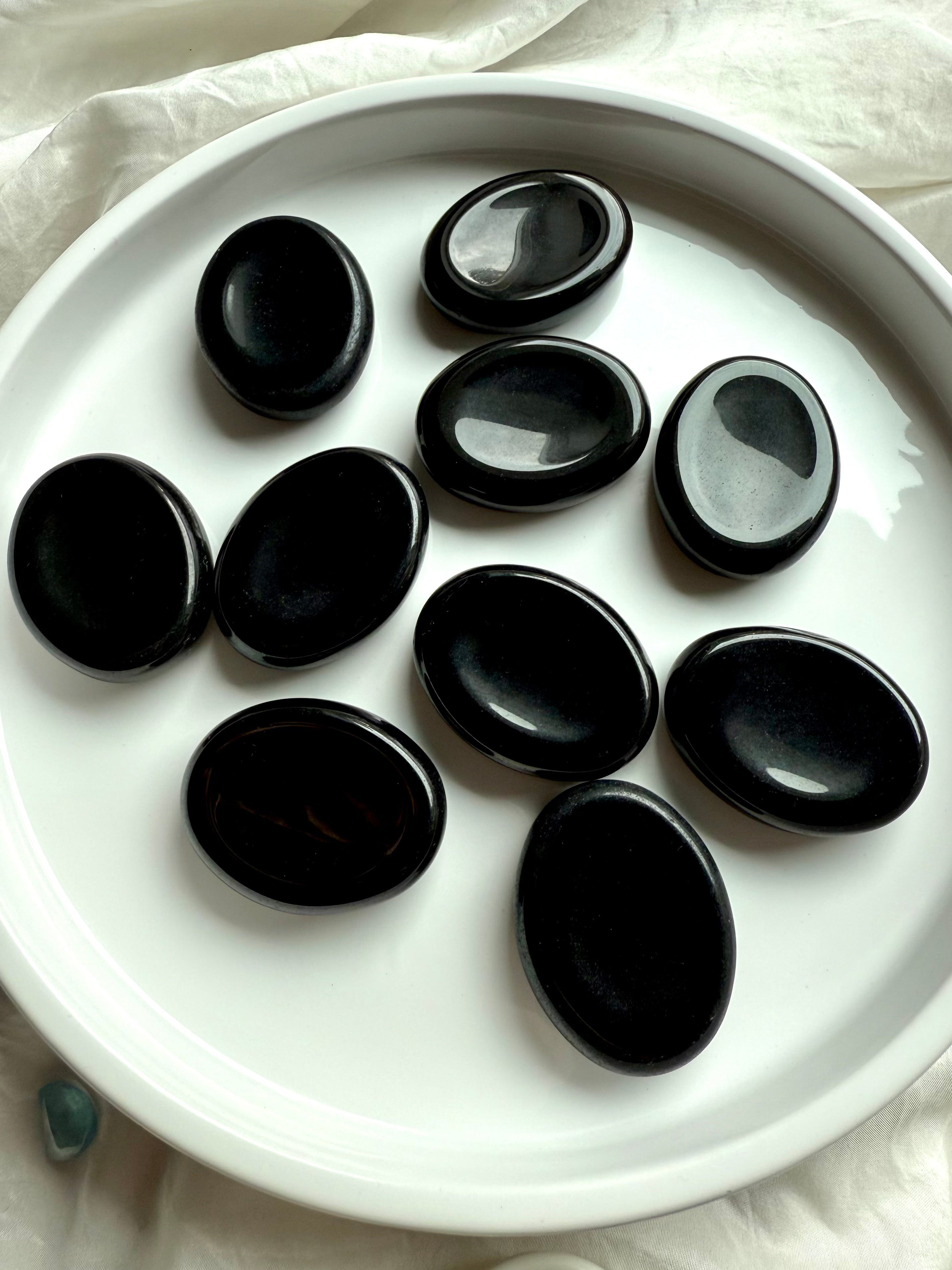 Group of 10 polished Black Obsidian worry stones – pocket-sized crystals for anxiety, grounding + spiritual balance