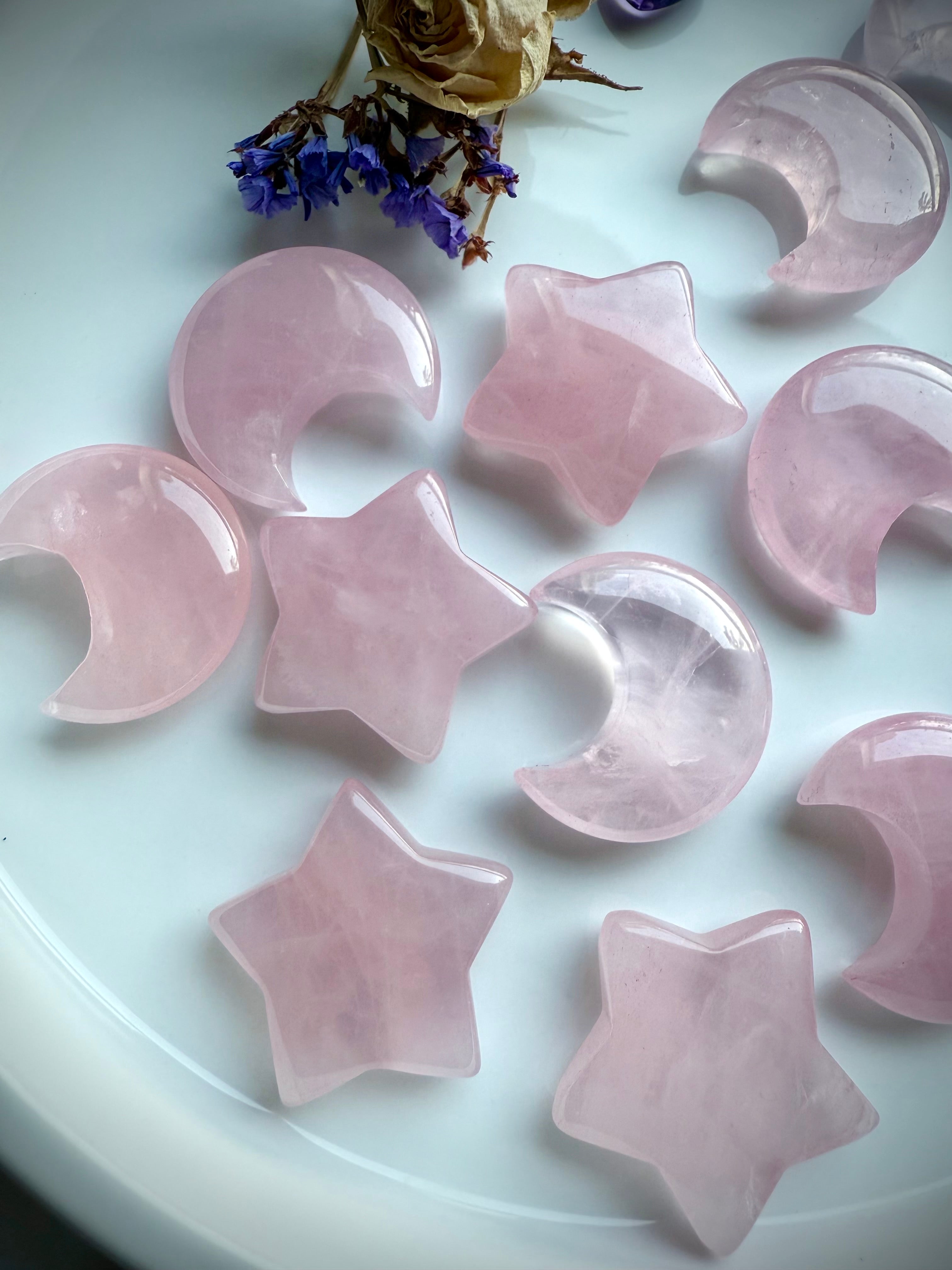 Pink rose quartz carvings for love, & soothing feminine energy.