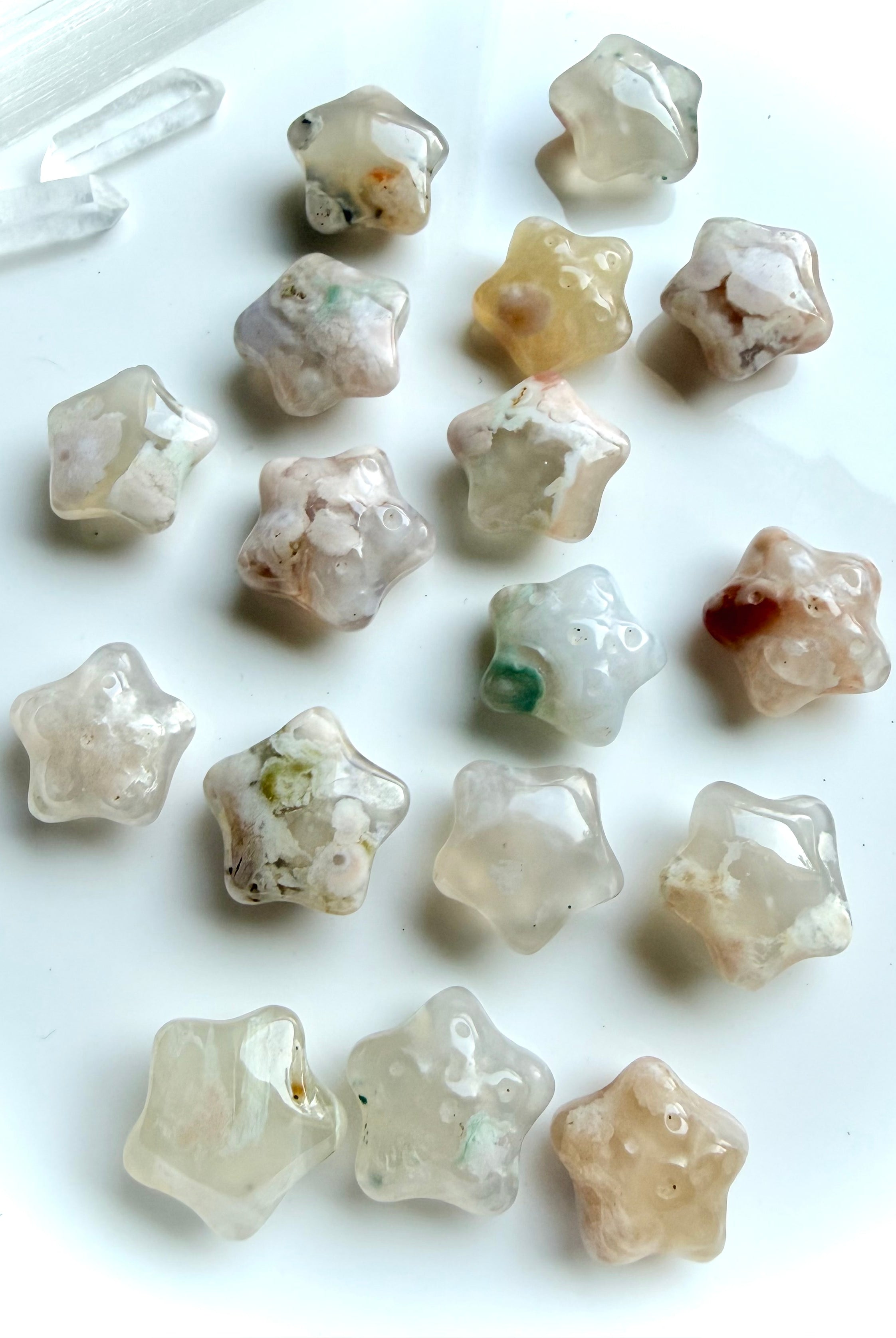 mini Flower Agate starfish carvings with soft floral plumes and pastel tones for emotional healing and growth