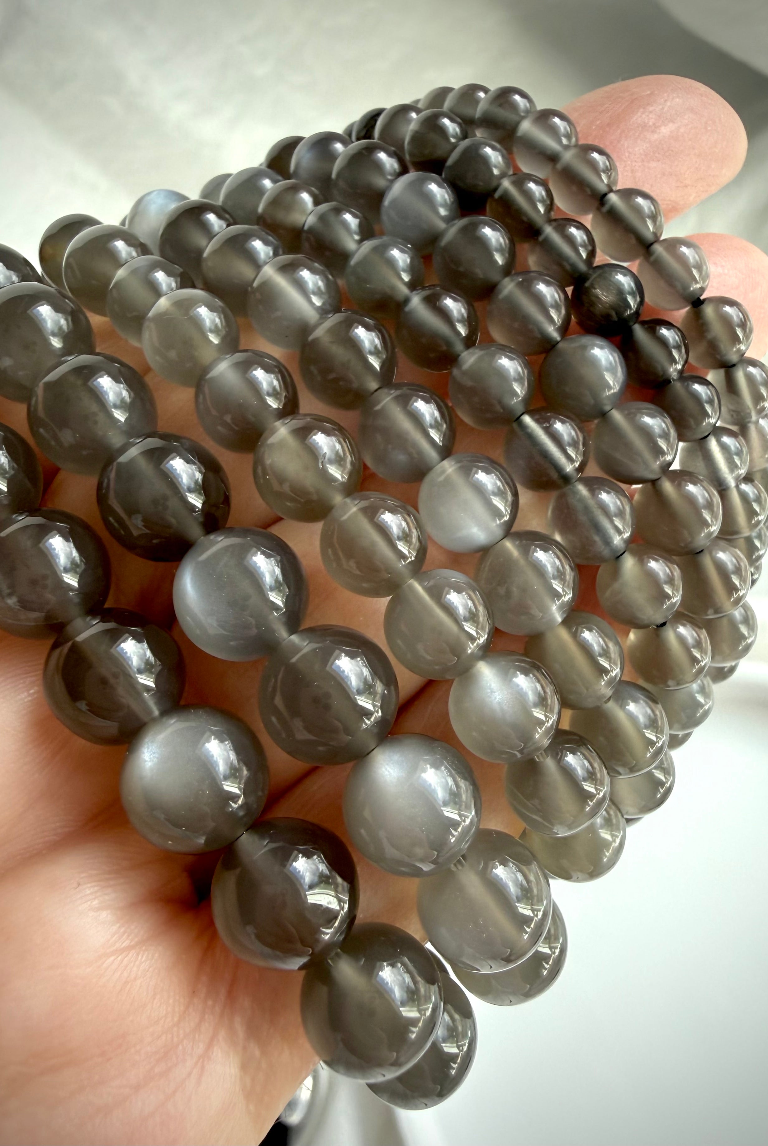 Black Moonstone bracelets with shimmering adularescence in multiple bead sizes from 5–12 mm