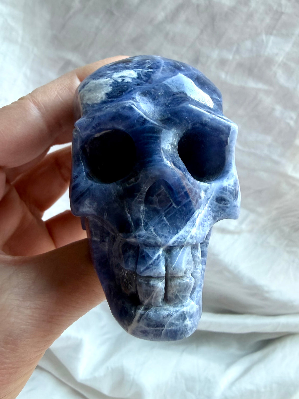 Hand carved Sodalite skull crystal for intuition, wisdom, Throat Chakra, and Third Eye Chakra work