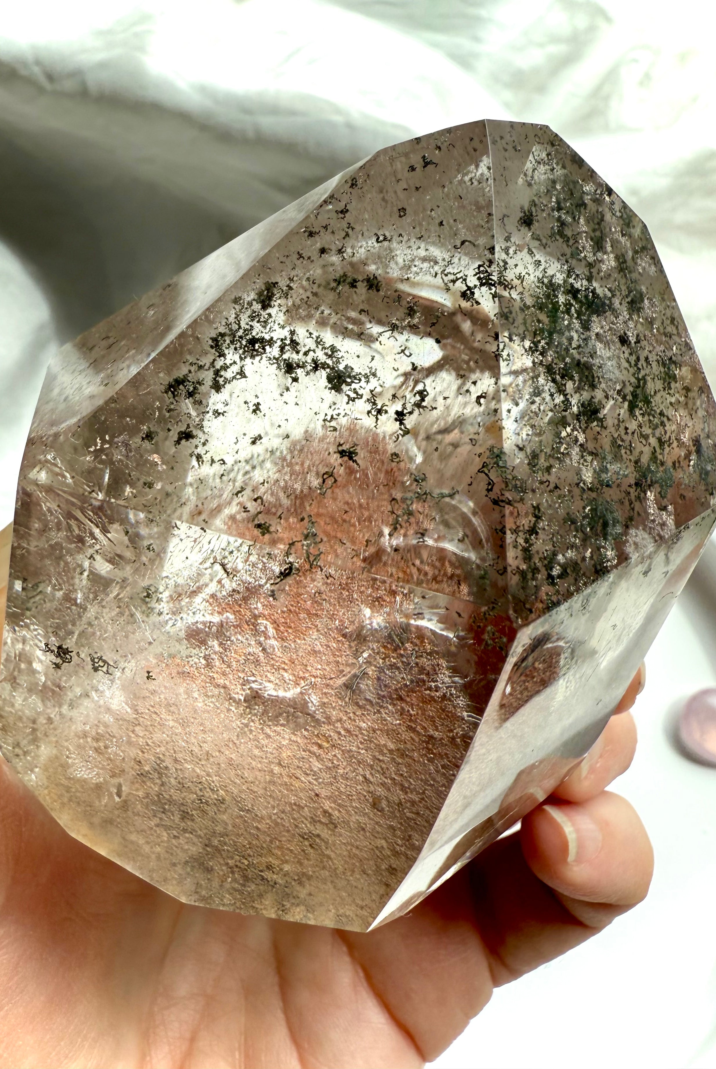 This Lodolite Garden Quartz Crystal is a Master Teacher that captures the light so beautifully