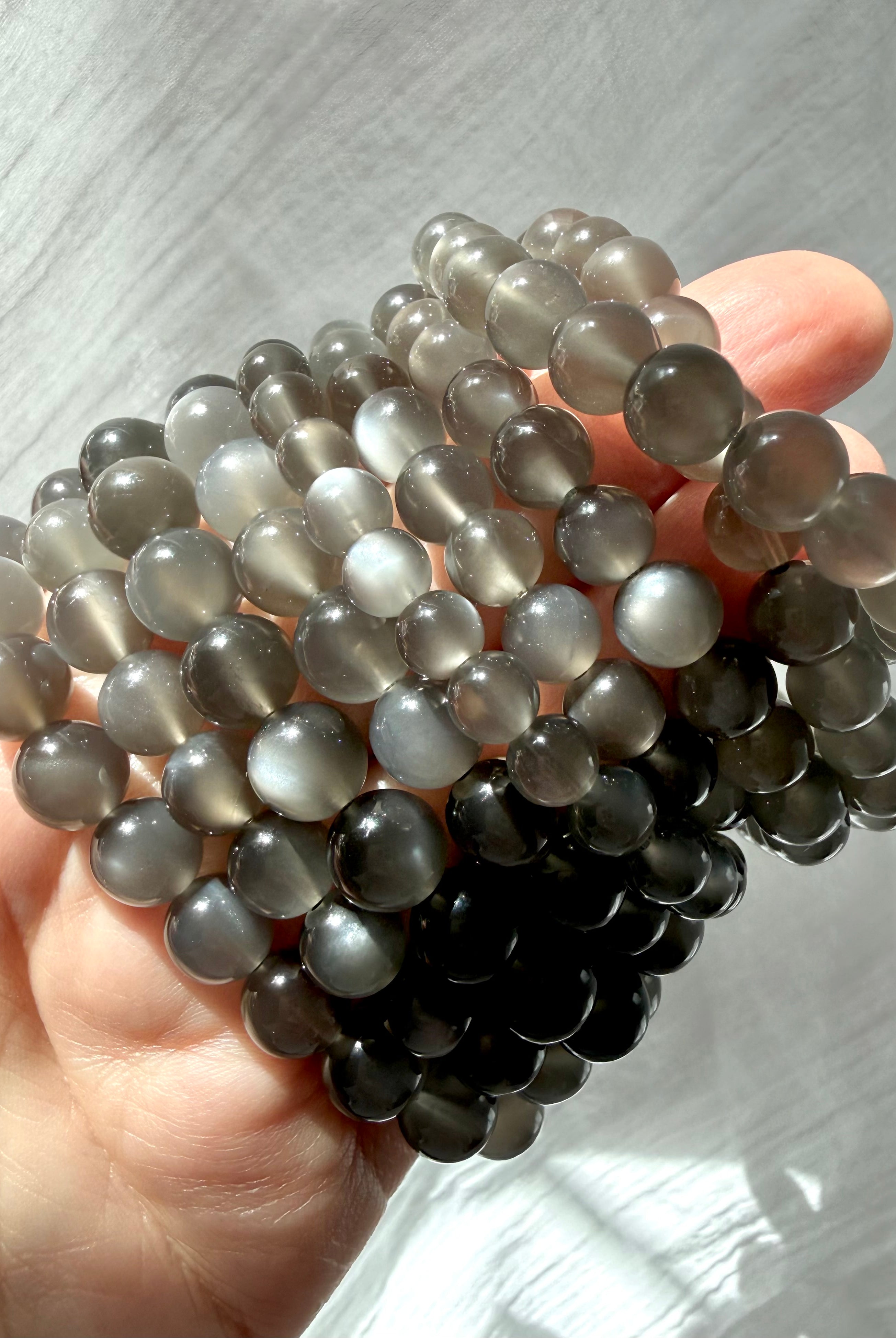 Natural Black Moonstone bracelets with silky moonlit shimmer and translucent inky charcoal tones