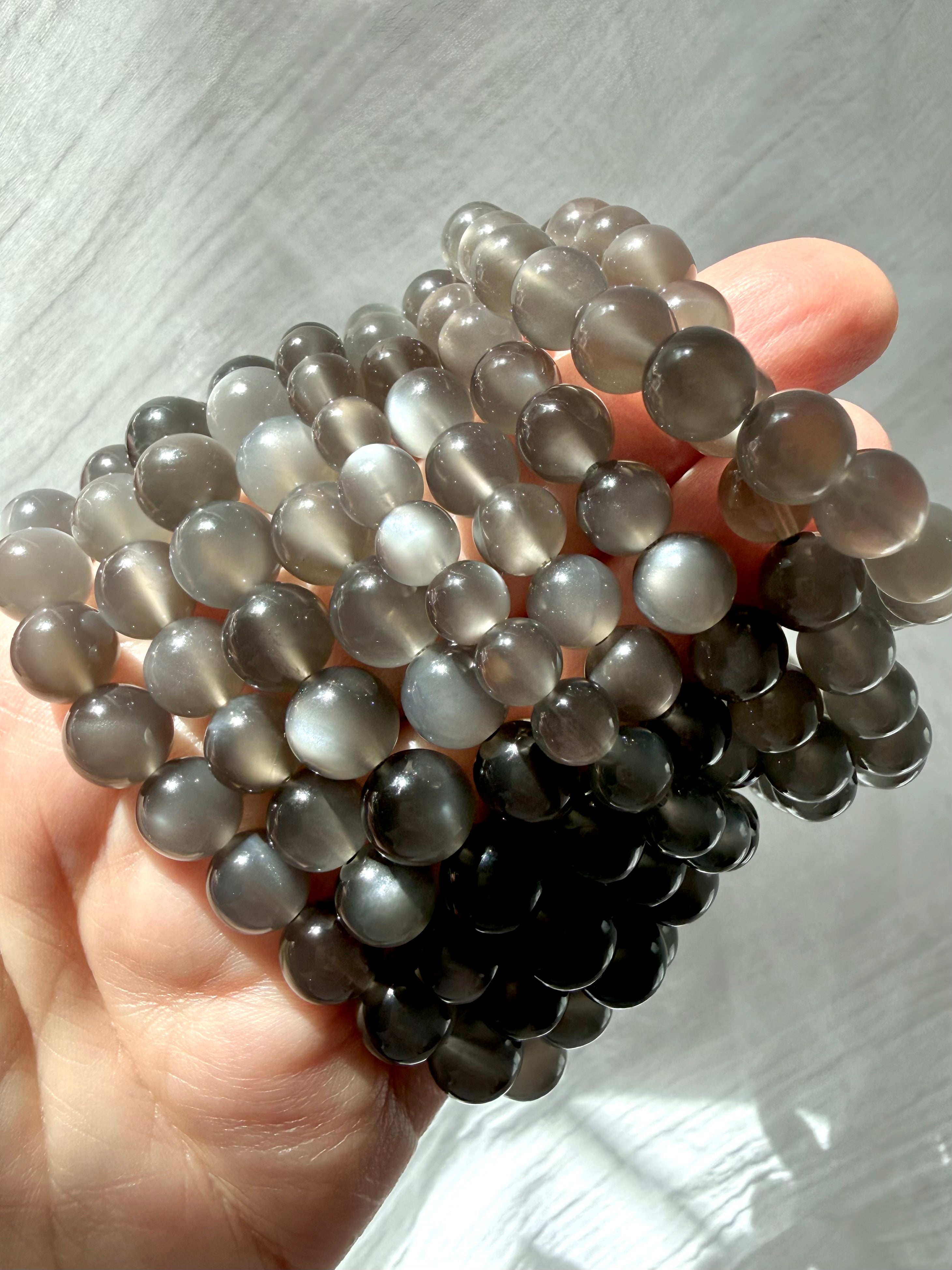 Natural Black Moonstone bracelets with silky moonlit shimmer and translucent inky charcoal tones