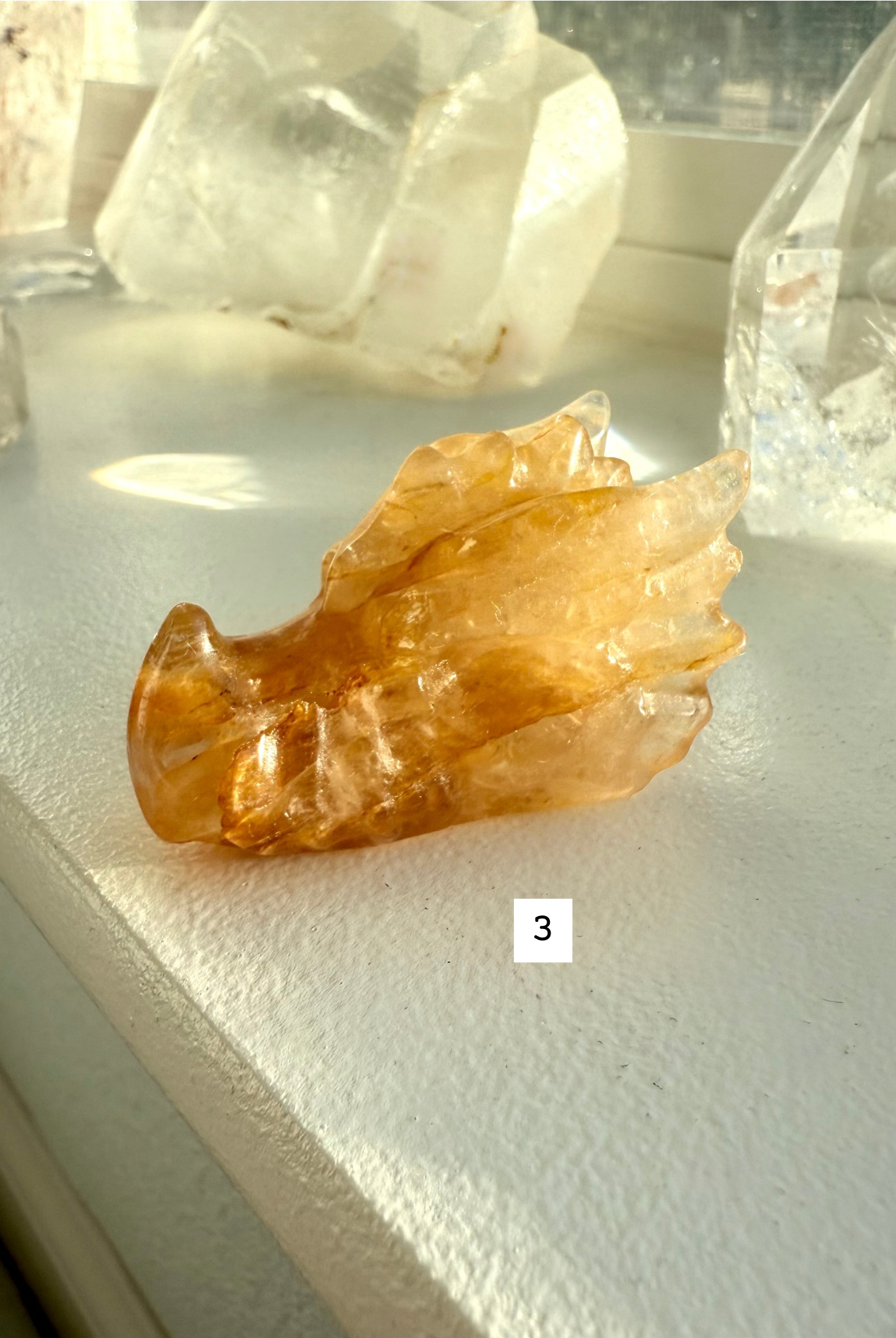 Golden Healer Quartz dragon head carving with bright honey and bronze tones — crystal carving for chakra healing, confidence, and empowerment.