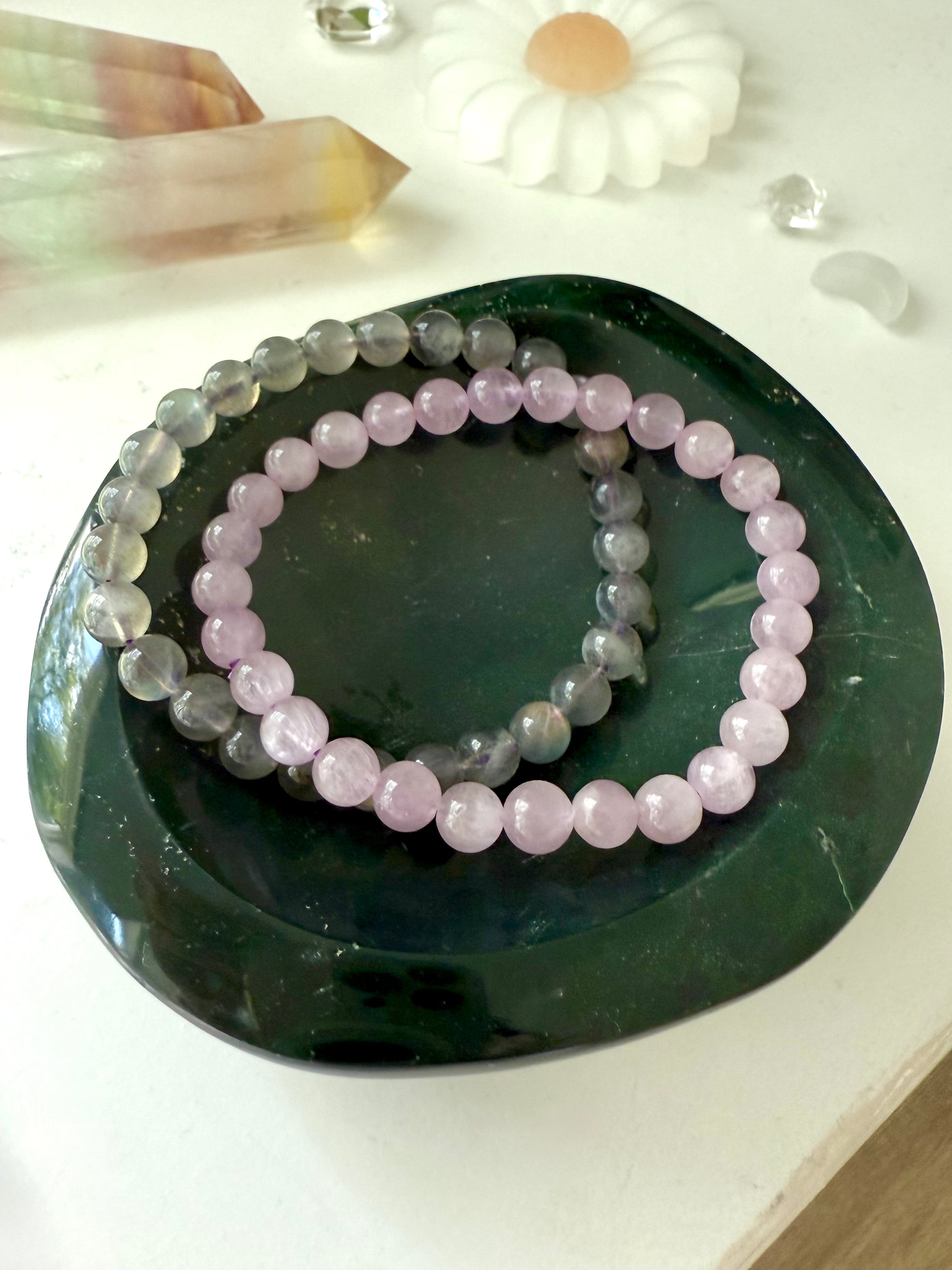 A one of a kind hand carved ocean jasper crystal bowl to organize + display your jewelry in style