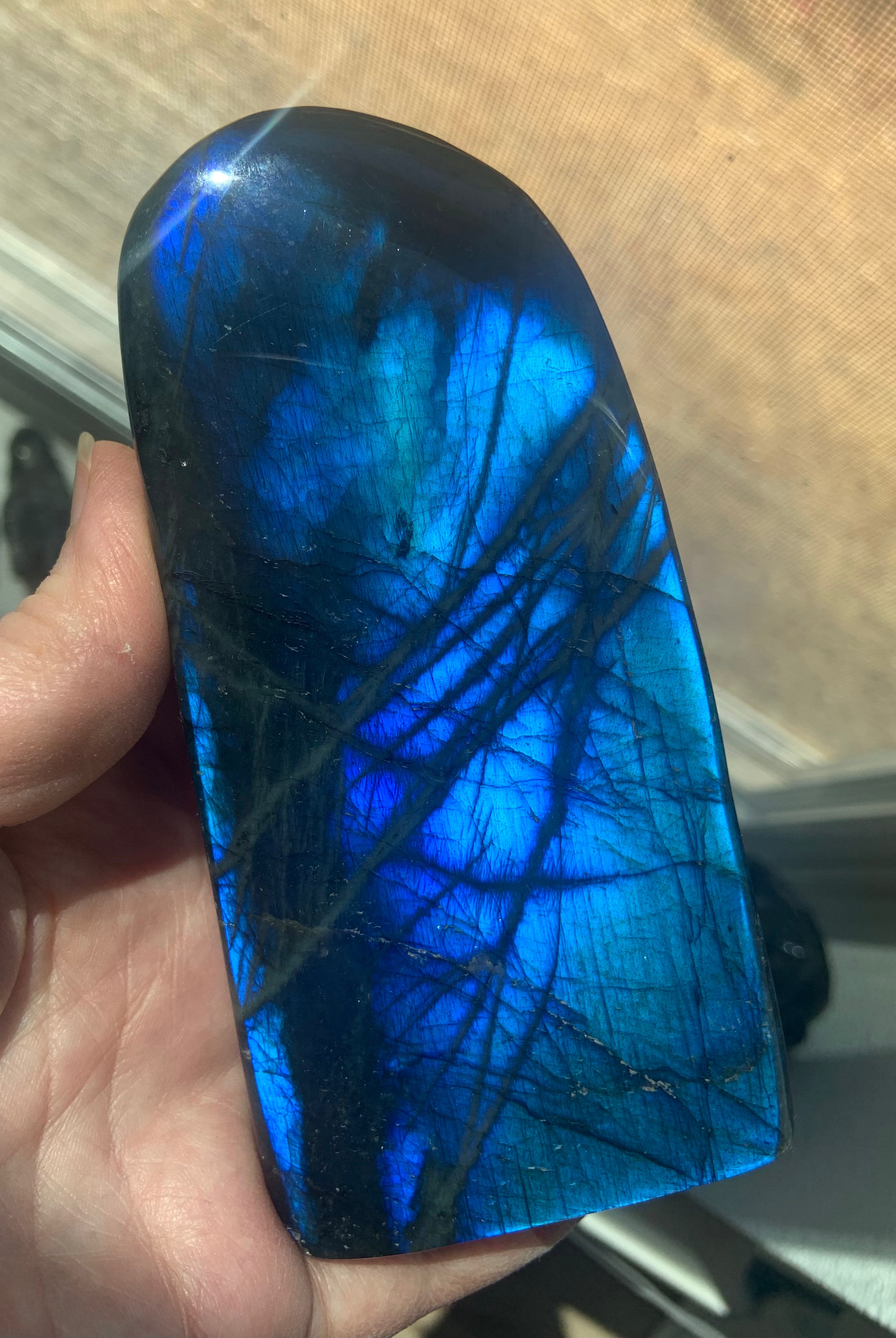 Very Blue, Very Flashy big Labradorite Freeform Statement Piece Crystal. The tall rounded oval shape is especially attractive + will make a magical addition to your sacred space.
