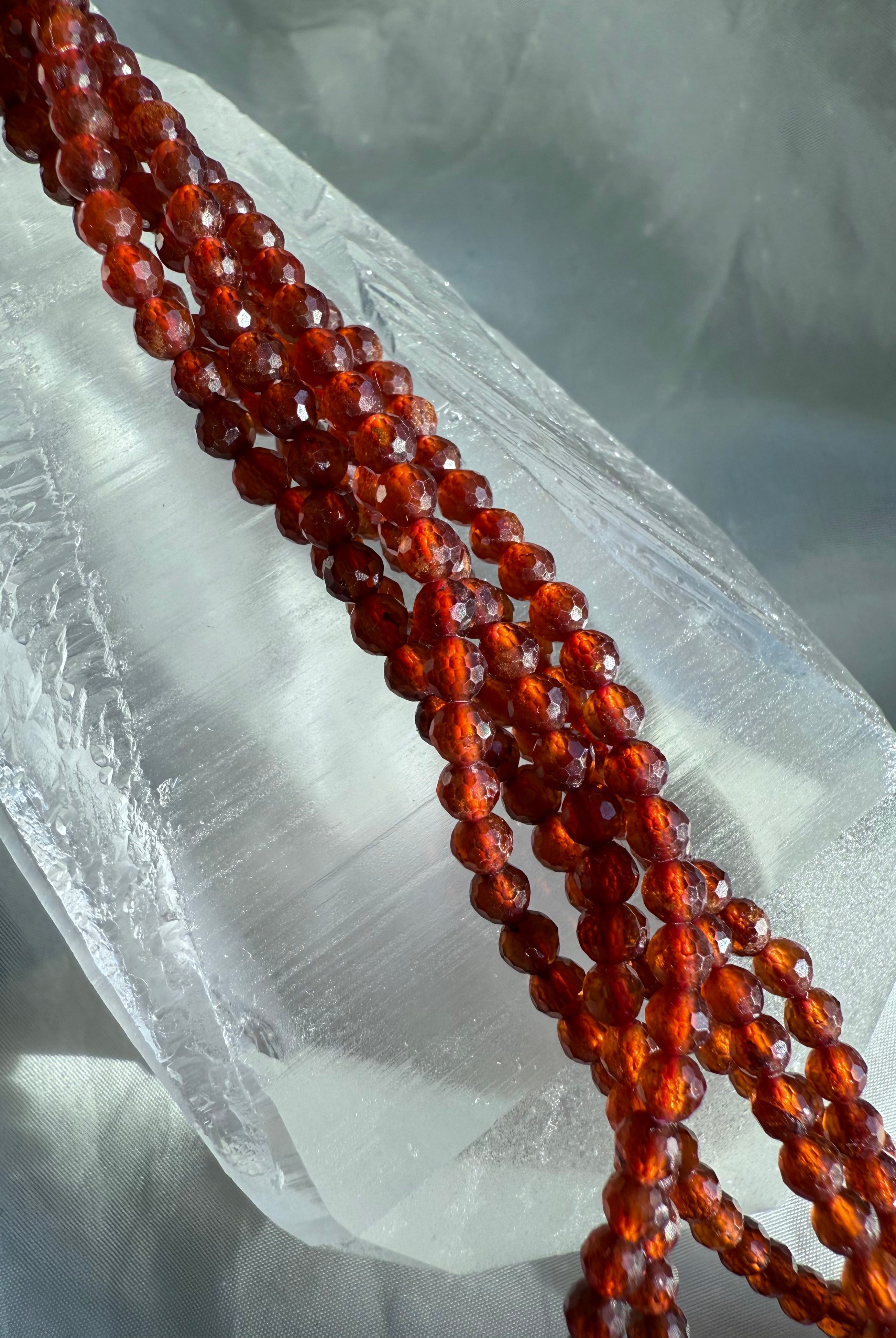 Made from sparkly faceted Spessartite Garnet beads with a vibrant orange color + gemmy transparency