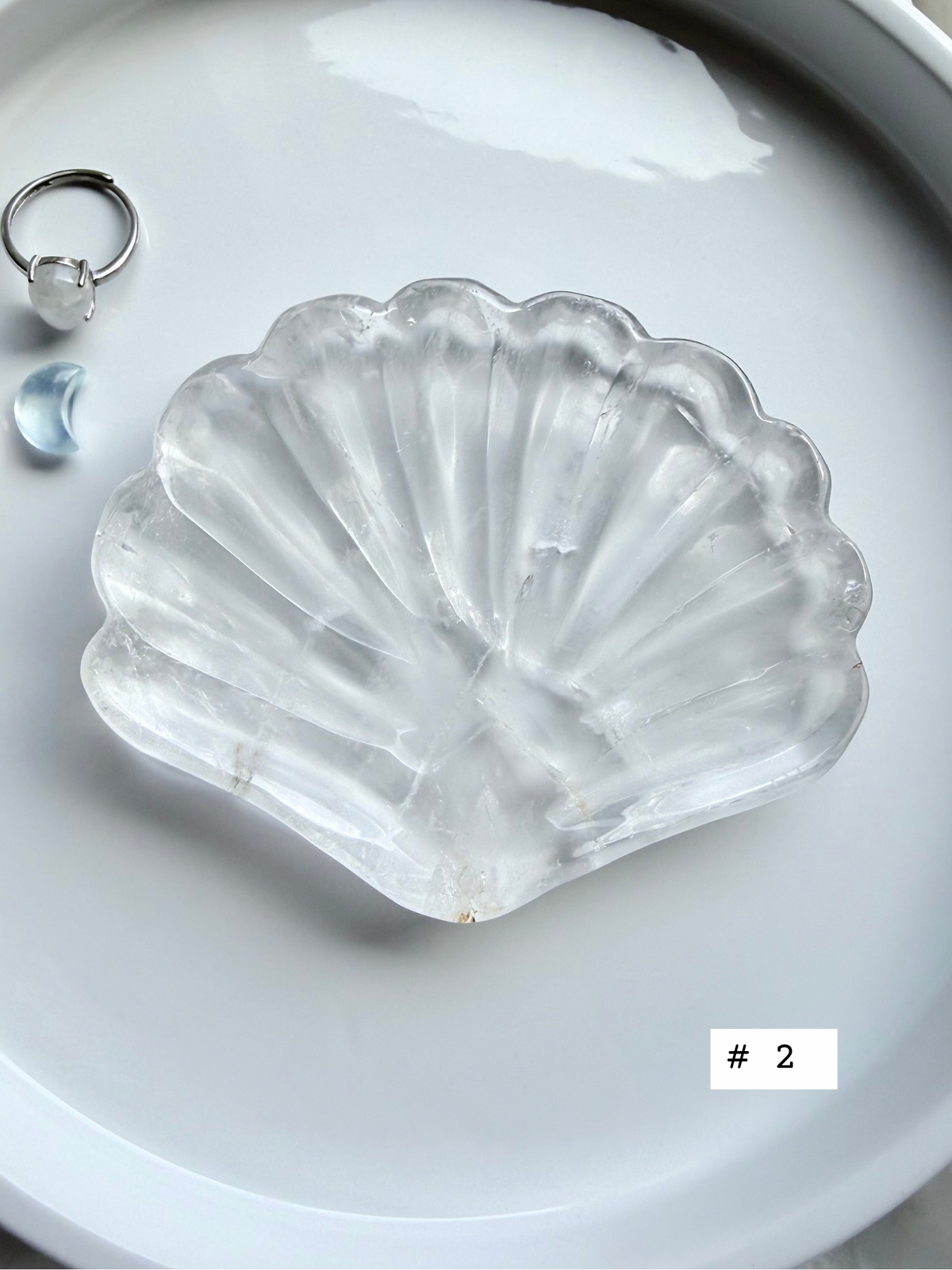 Clear Quartz shell bowl, individual piece #2, showing natural crystal patterns and polished scallop carving.