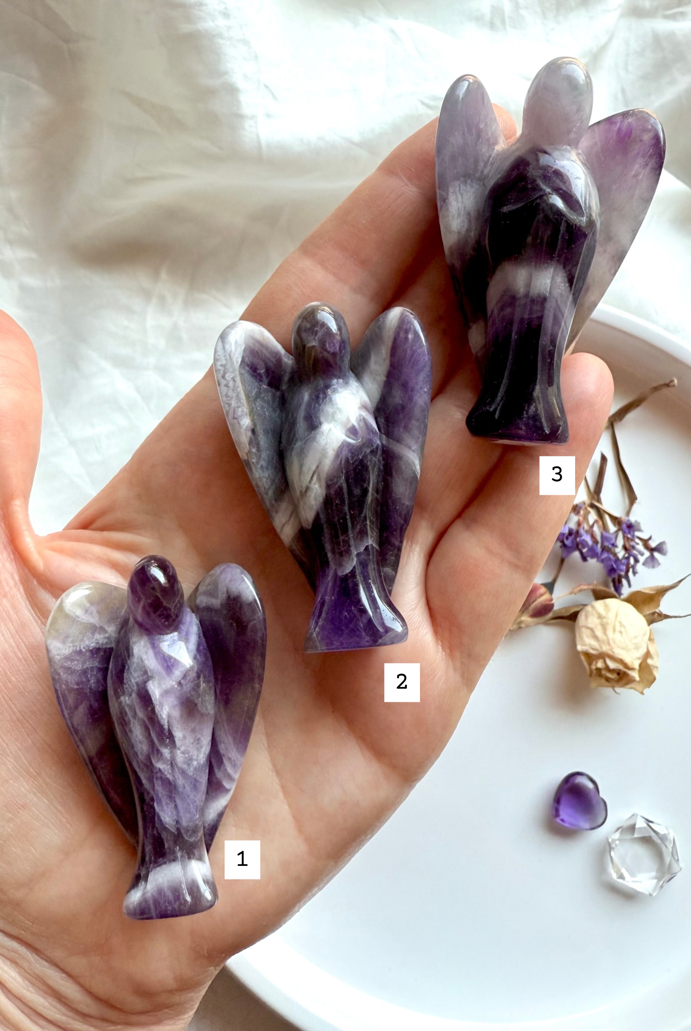 Crystal angel carvings in natural banded Amethyst and Quartz