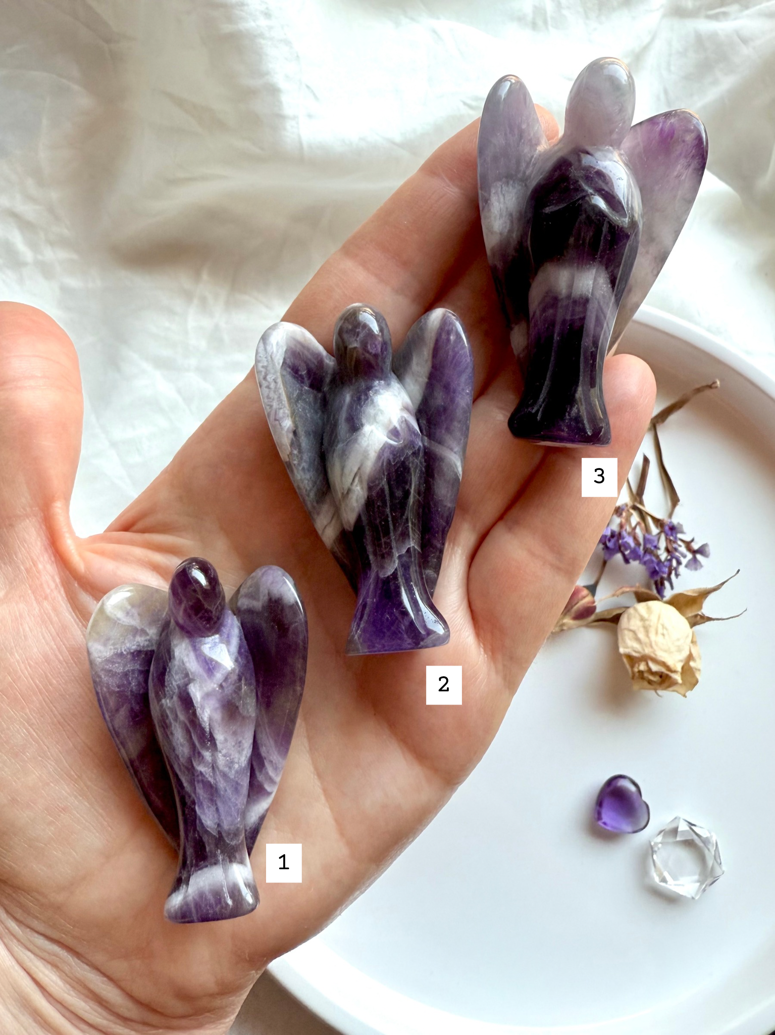 Crystal angel carvings in natural banded Amethyst and Quartz
