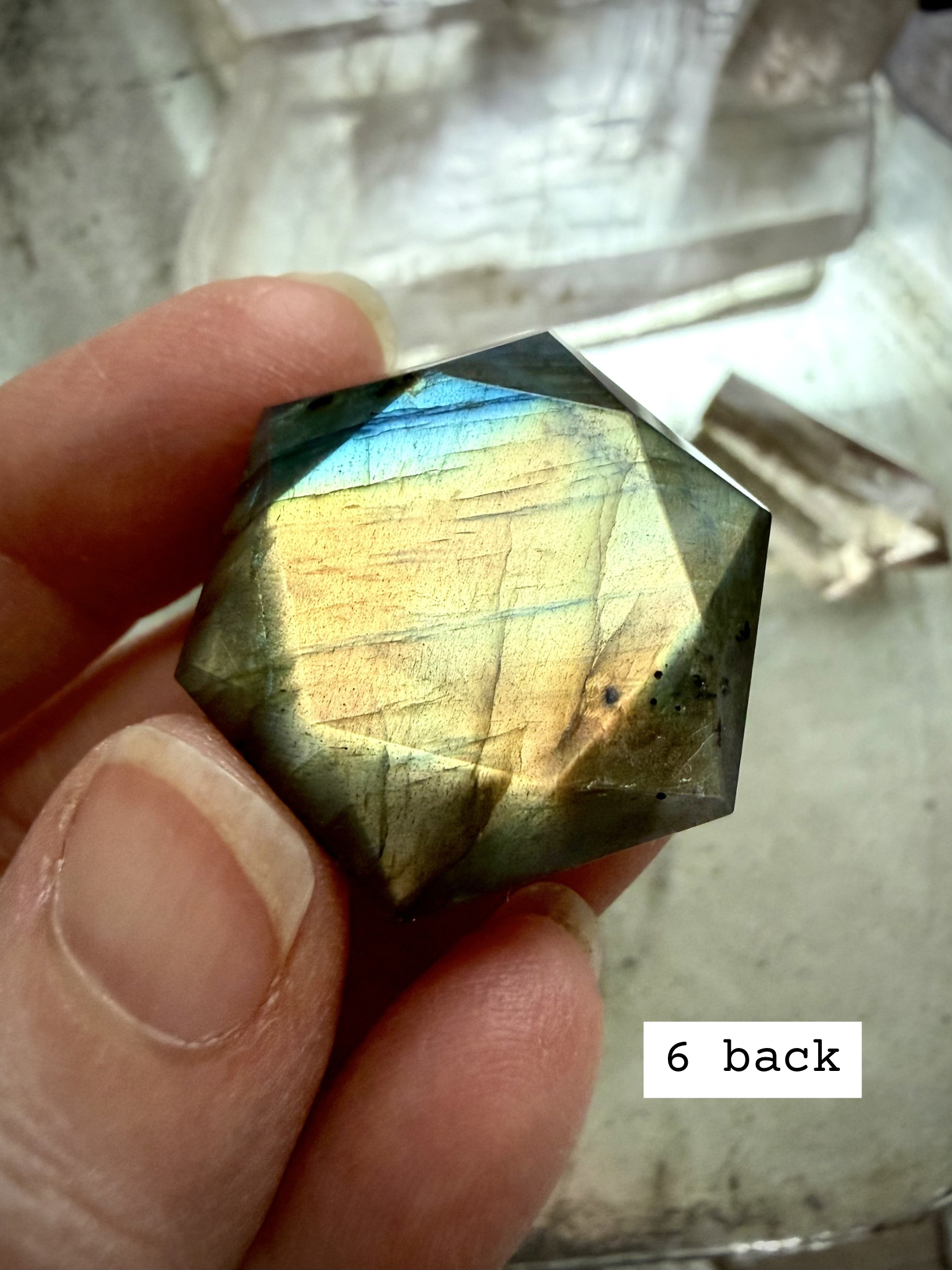Faceted Labradorite hexagon crystal – sacred geometry hexagon for intuition and psychic clarity, gold and blue iridescent flash, back view