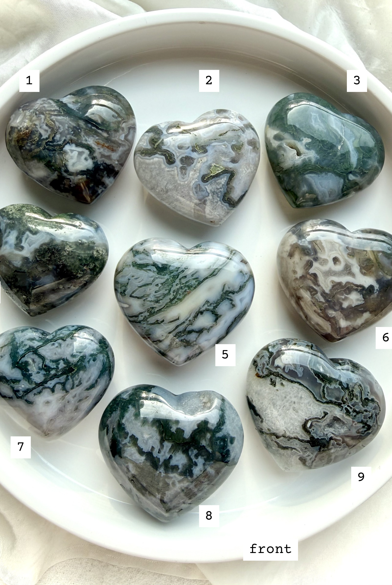 moss agate heart carvings options 1 through 9 front view choose your favorite crystal hearts with natural green inclusions and patterns