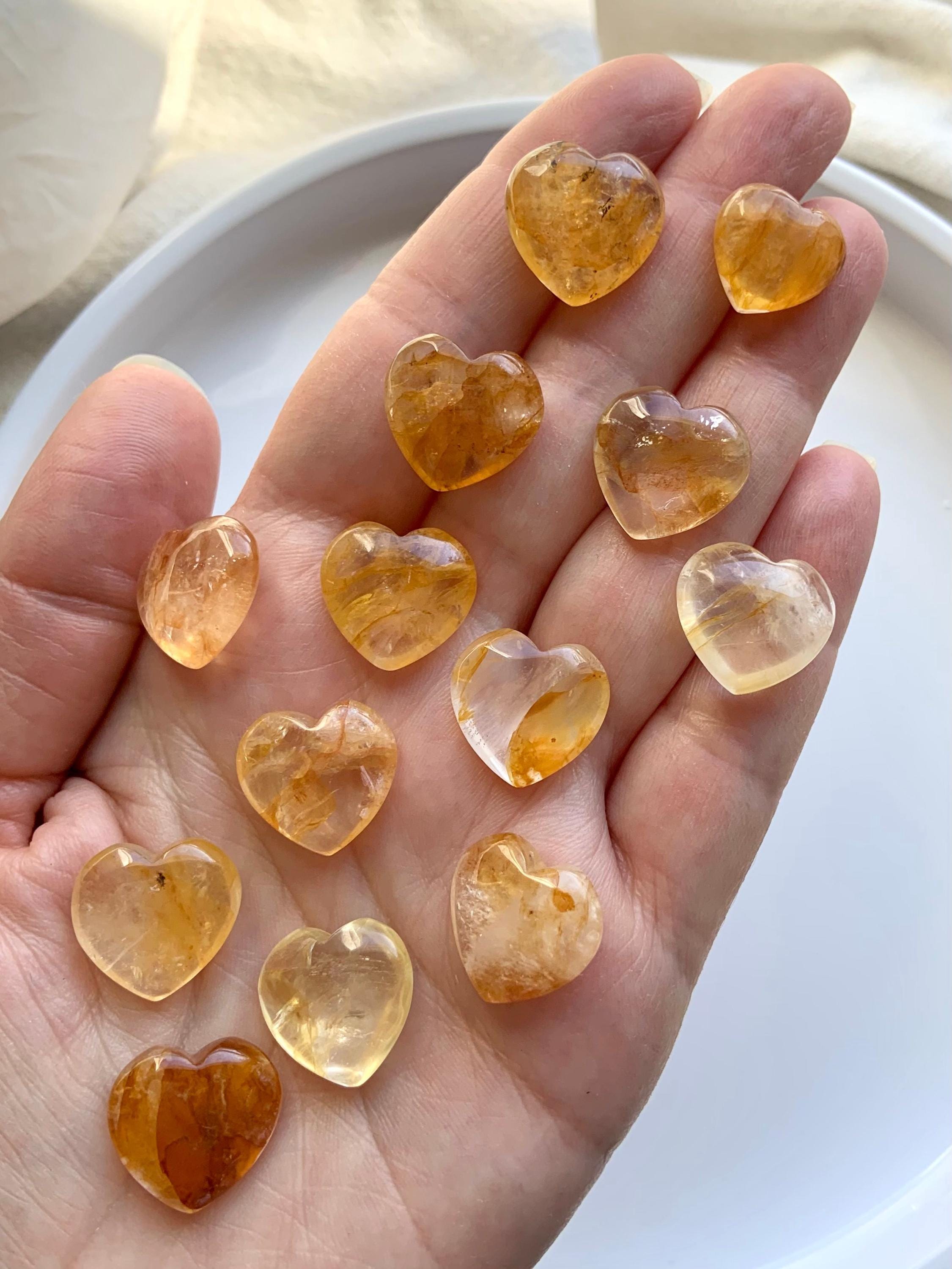 Mini Golden Healer Hearts shown on my hand for scale