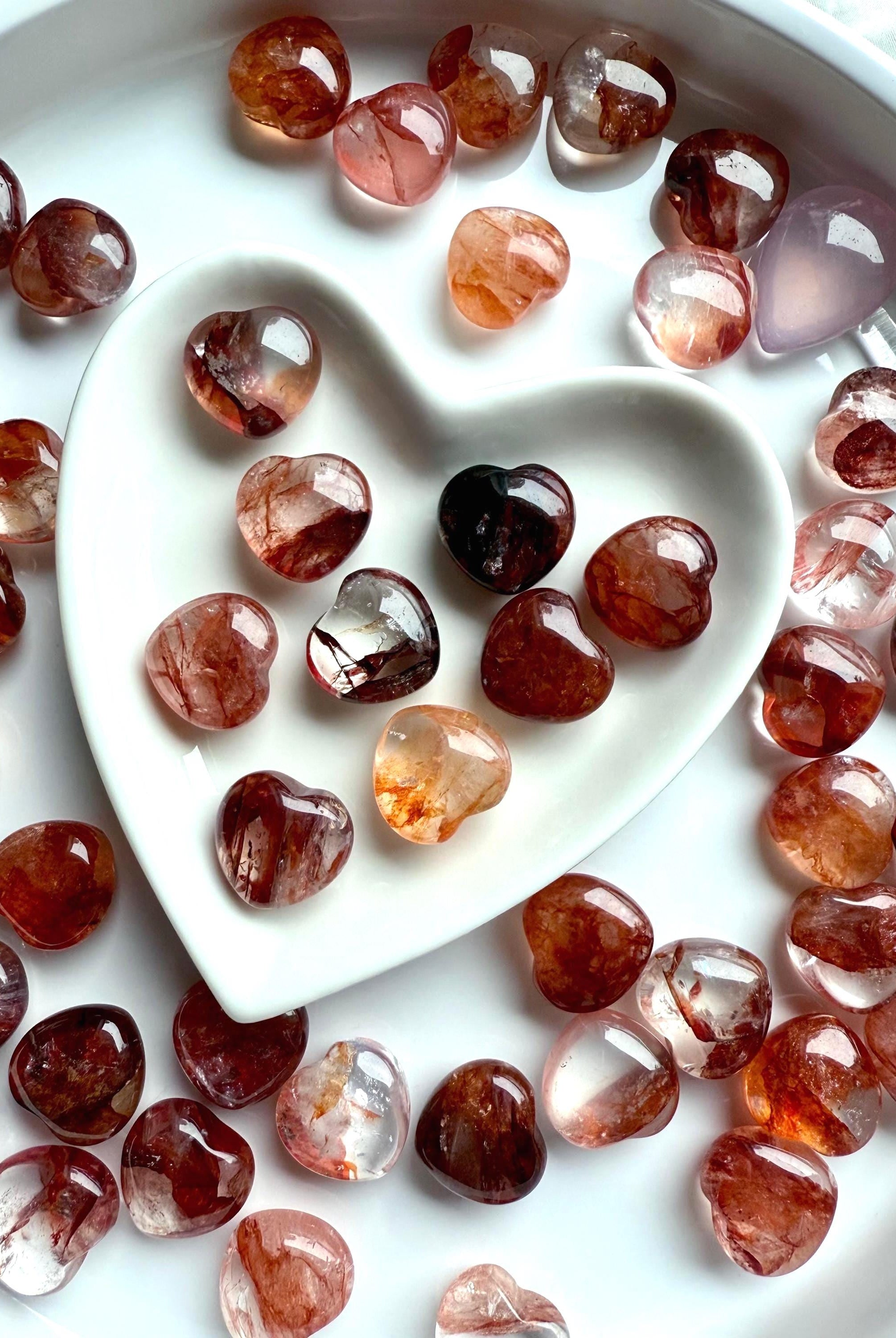 Gemmy, high quality Mini Fire Quartz Crystal Hearts shown in a white heart bowl