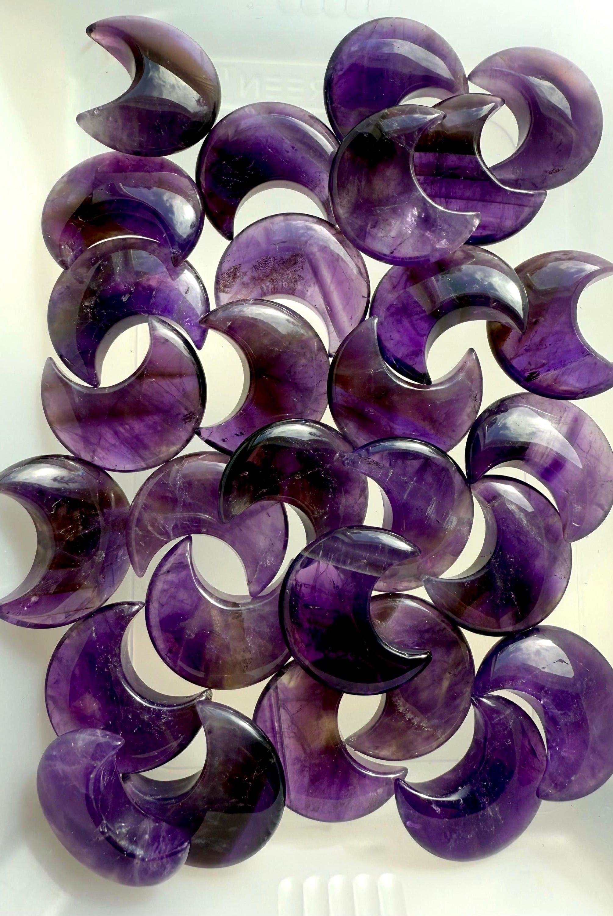Deep purple Dream Amethyst Moons to promote spiritual growth while shielding you from negative vibes