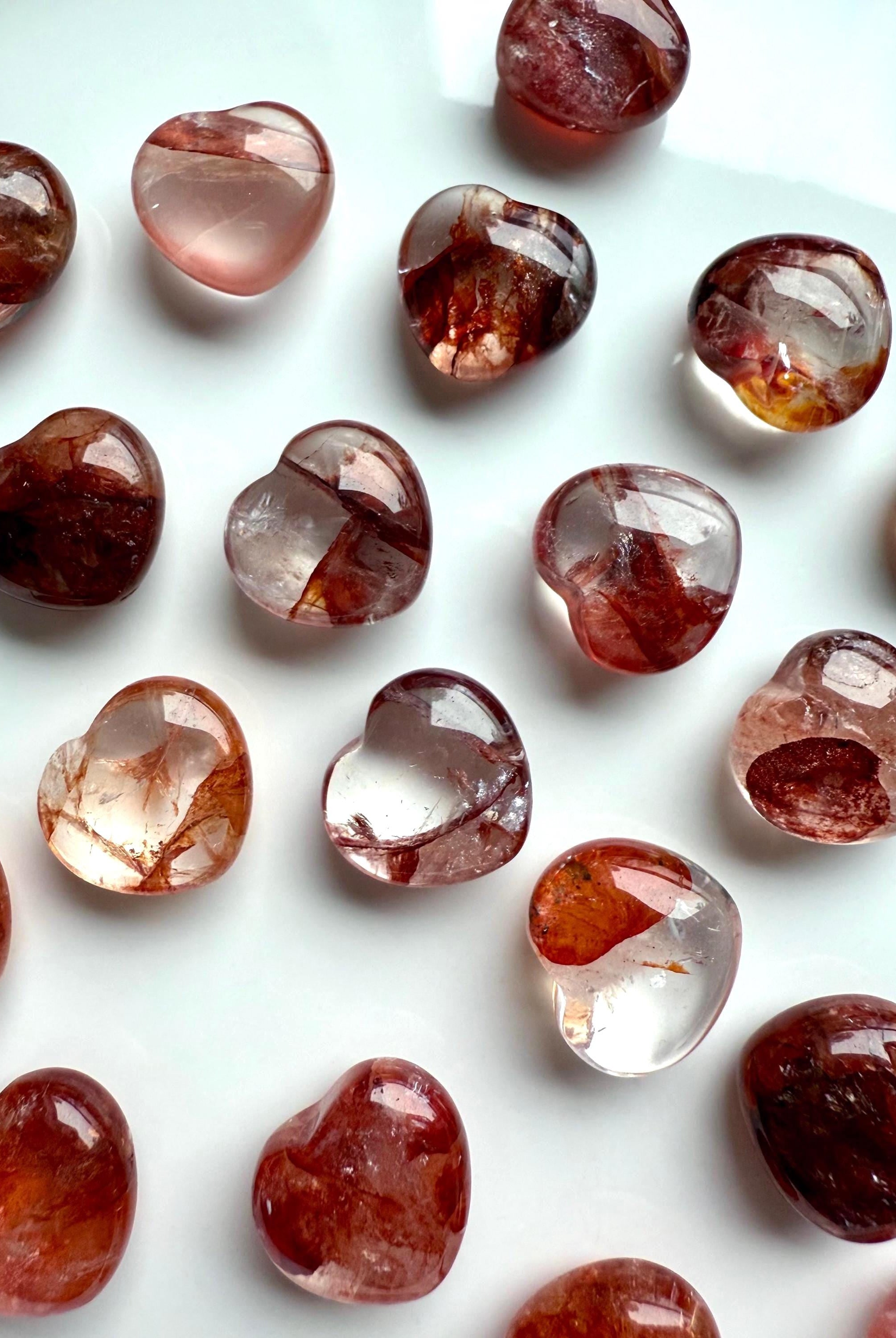 Fire Quartz heart showing hematite banding and clear matrix