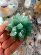 Green Aventurine succulent carving shown in hand — crystal flower for abundance, love & heart-centered intentions.