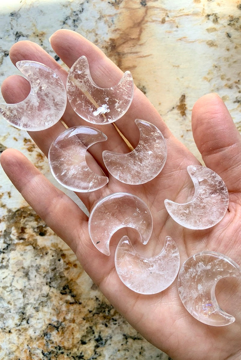 Handful of polished Clear Quartz crescent moons for meditation, crystal grids, and altar decor