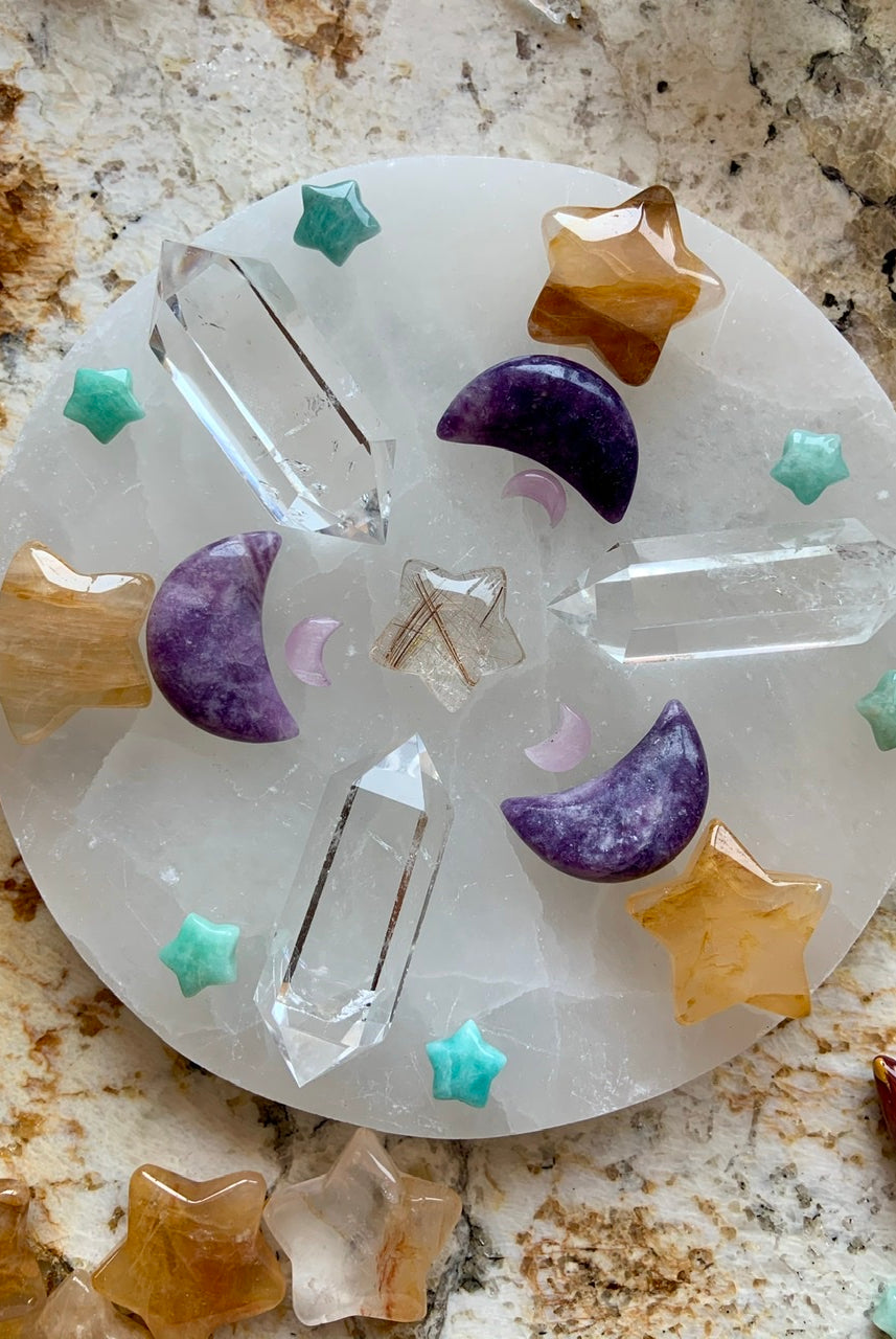 Lepidolite Crystal Moon and Star shaped carvings are a beautiful addition to your crystal grids