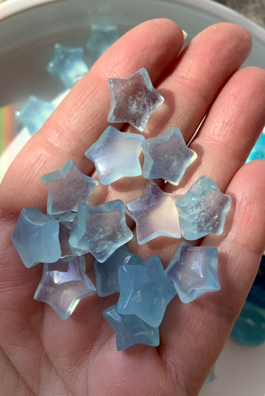 Close-up of Aquamarine stars showing internal clarity and translucent blue