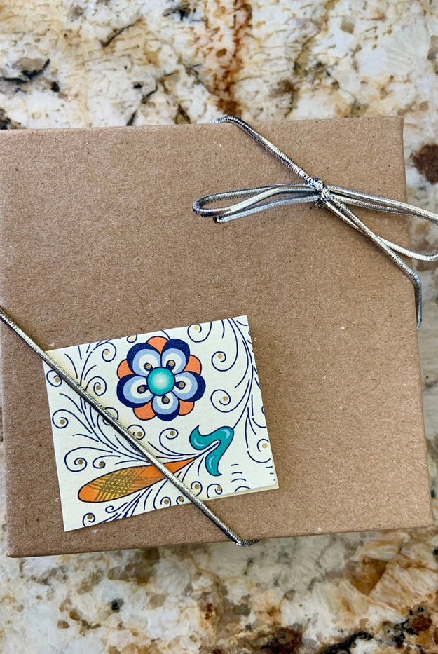 Our bracelets arrive gift-ready in a jewelry box with a bow + a pretty sticker.