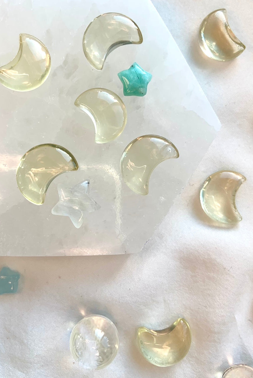 Mini citrine moon carvings on hexagonal selenite with crystal stars — citrine crystals for manifestation and solar energy alignment