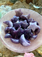 Ultra soothing purple Lepidolite is the crystal ally to reach for when you're feeling anxious
