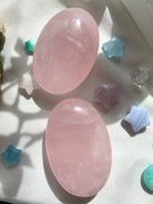 Palm sized, smooth polished rose quartz to hold in meditation + decorate your sacred space