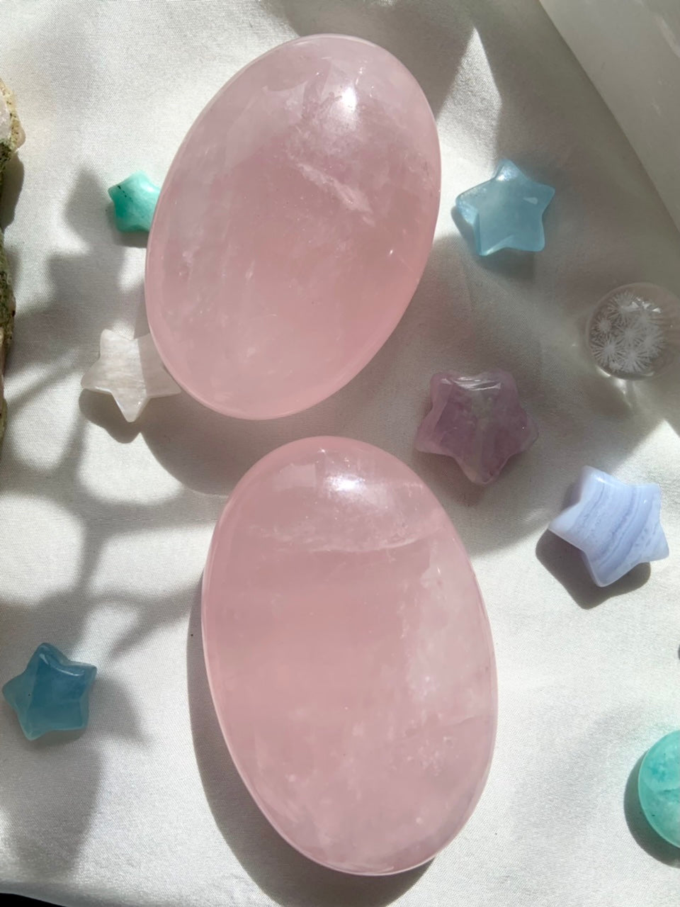 Palm sized, smooth polished rose quartz to hold in meditation + decorate your sacred space