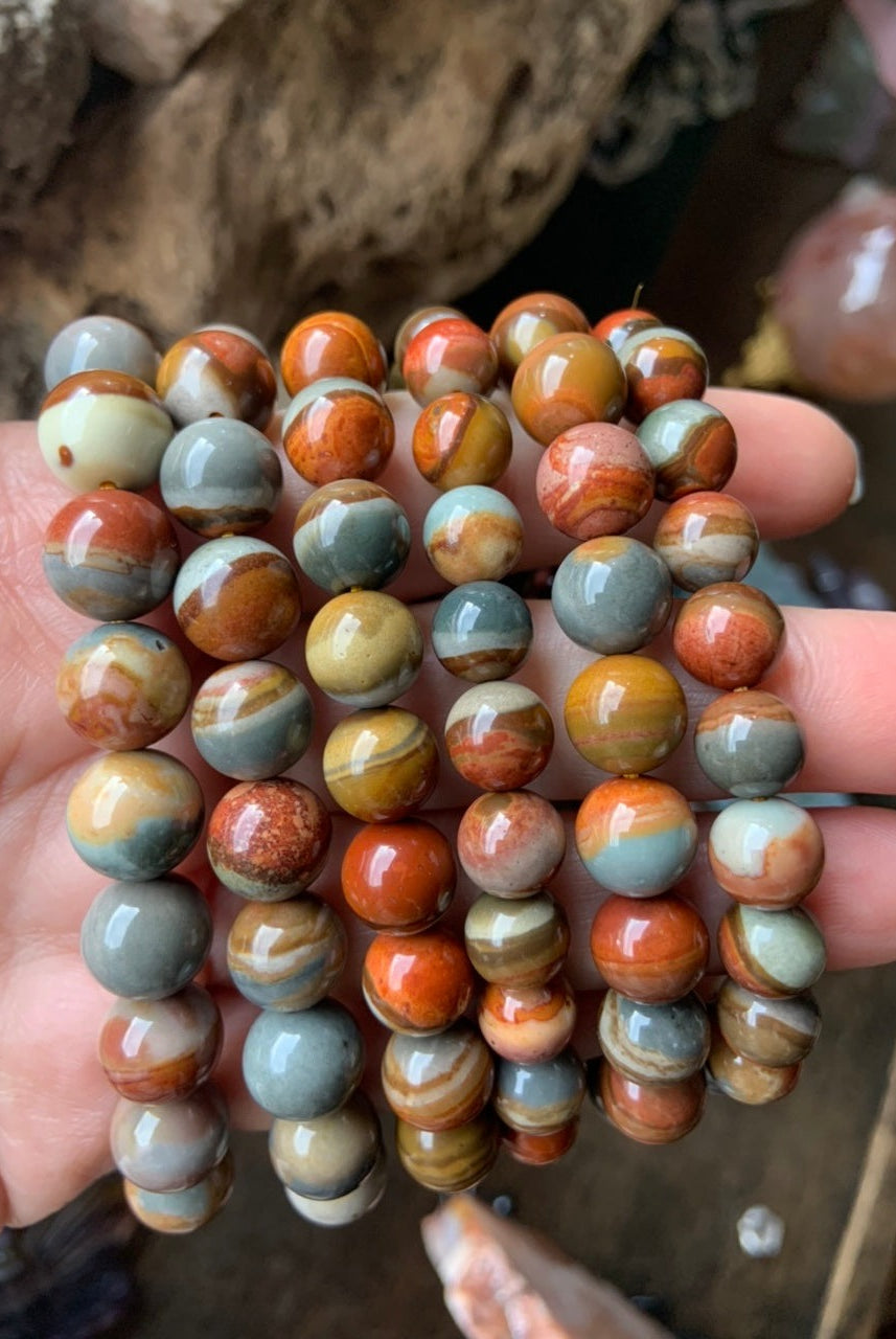 Wear your Polychrome Jasper bracelets to open the Root Chakra + embody your higher self.