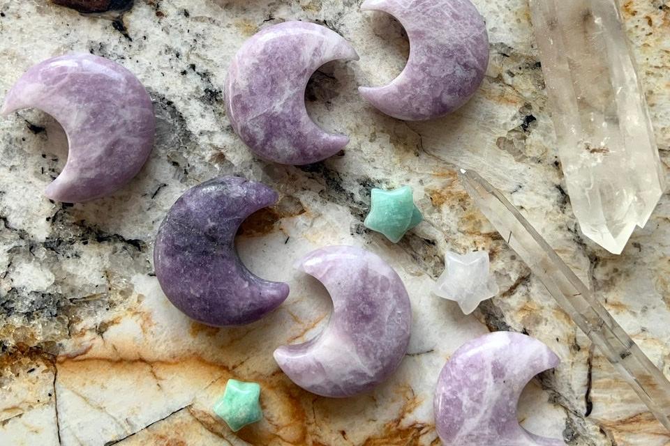 Lepidolite moons and mini crystals with quartz points on marble — soothing purple crystals for stress relief, heart chakra healing, and inner peace