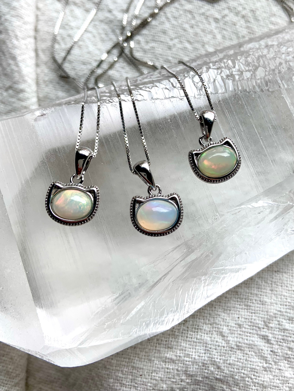 Crystal pendants and necklaces in sterling silver with natural gemstone cabochons