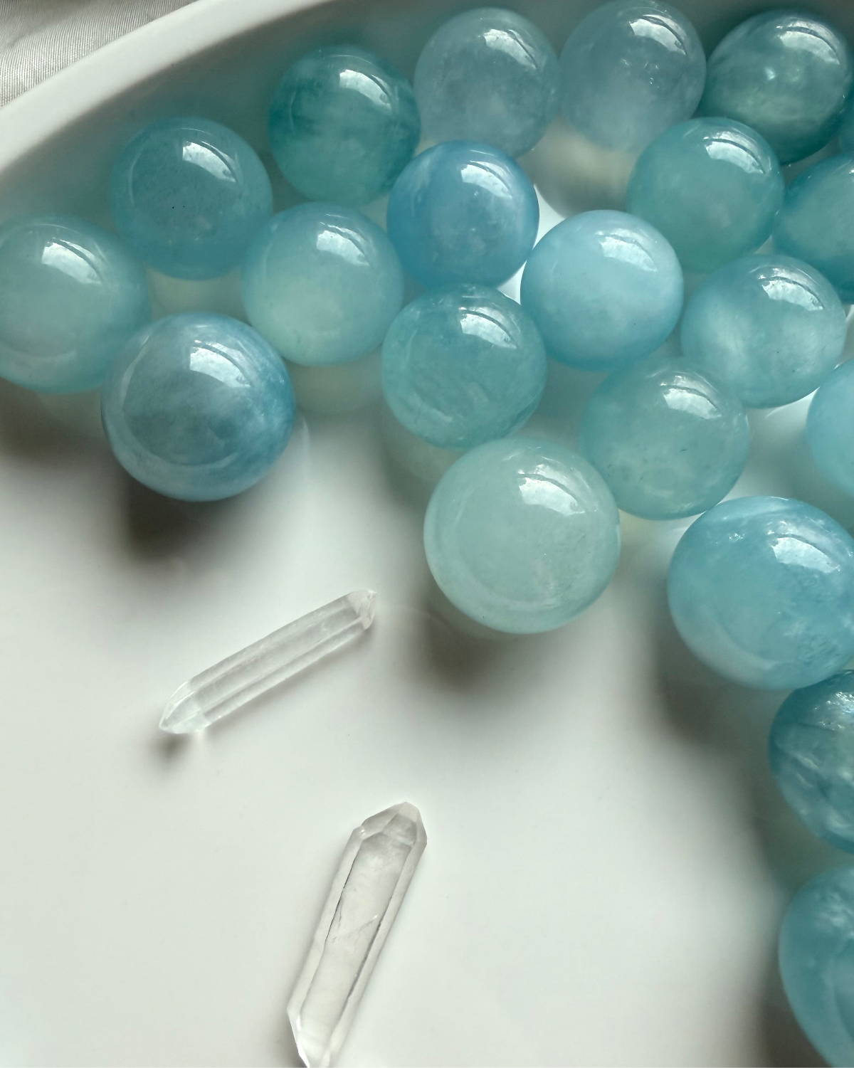 Aquamarine mini crystal spheres in calming ocean blue – March birthstone crystal