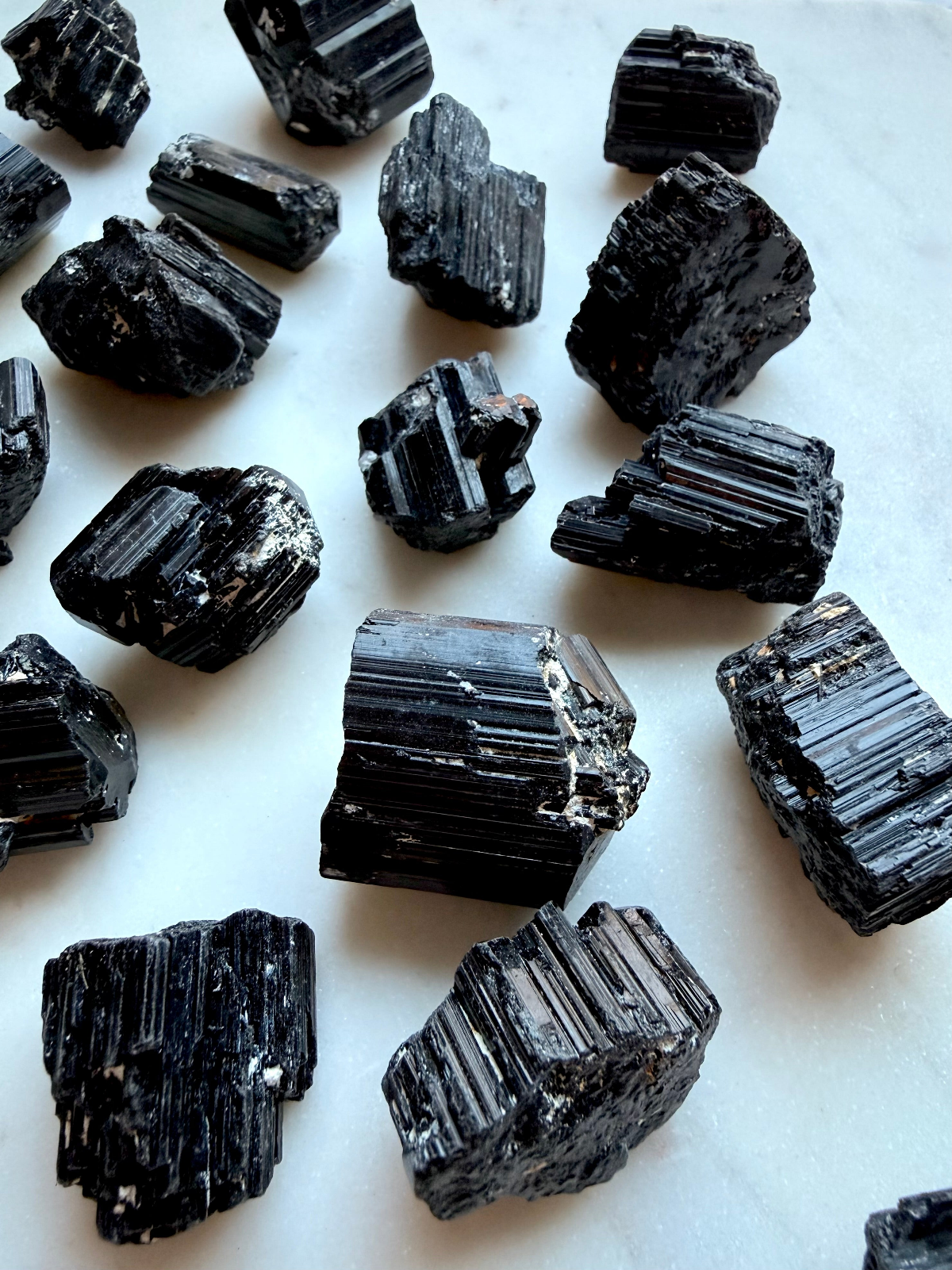 Raw Black Tourmaline crystals with natural striations, grounding and protective stones for energetic clearing, strength and Root Chakra healing