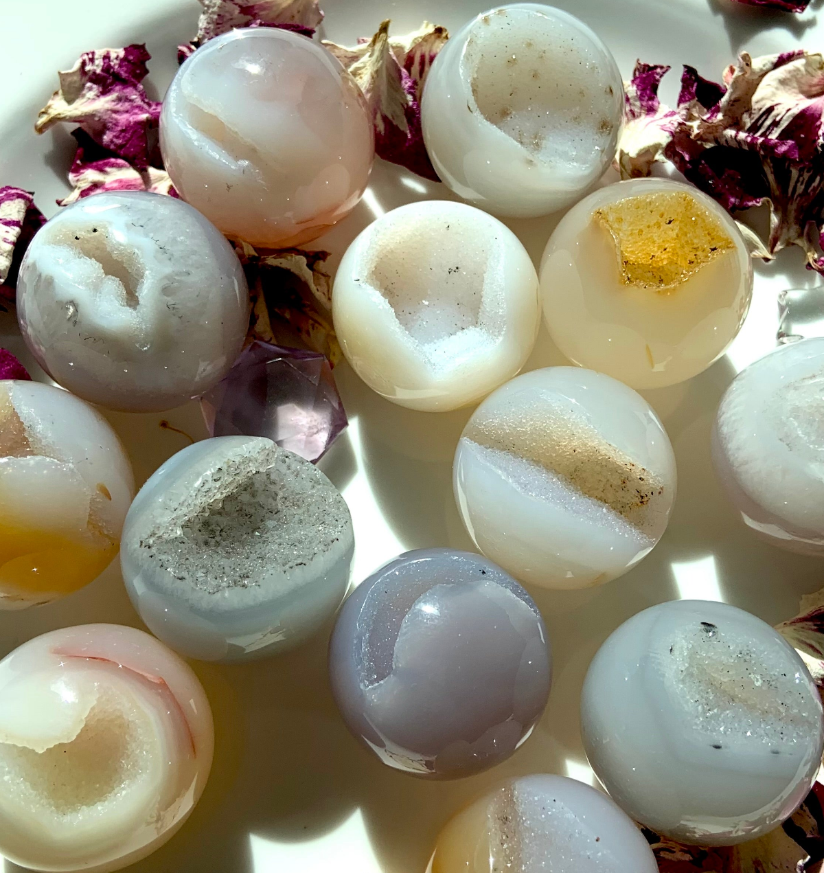 Natural crystal geodes with sparkling druzy quartz, agate banding and colorful crystal formations