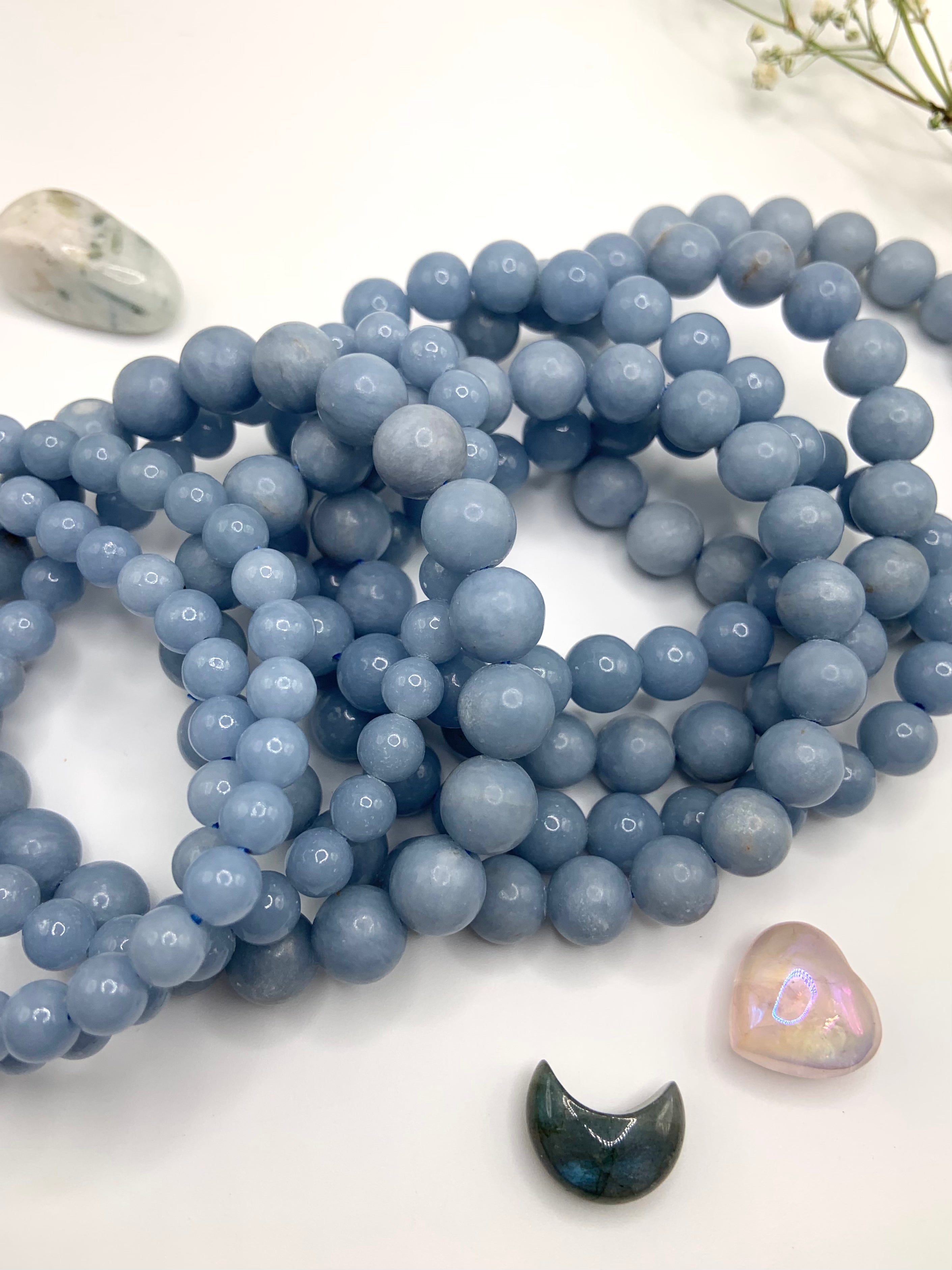 Soothing Angelite crystal bracelets for peace, intuition & Throat Chakra healing