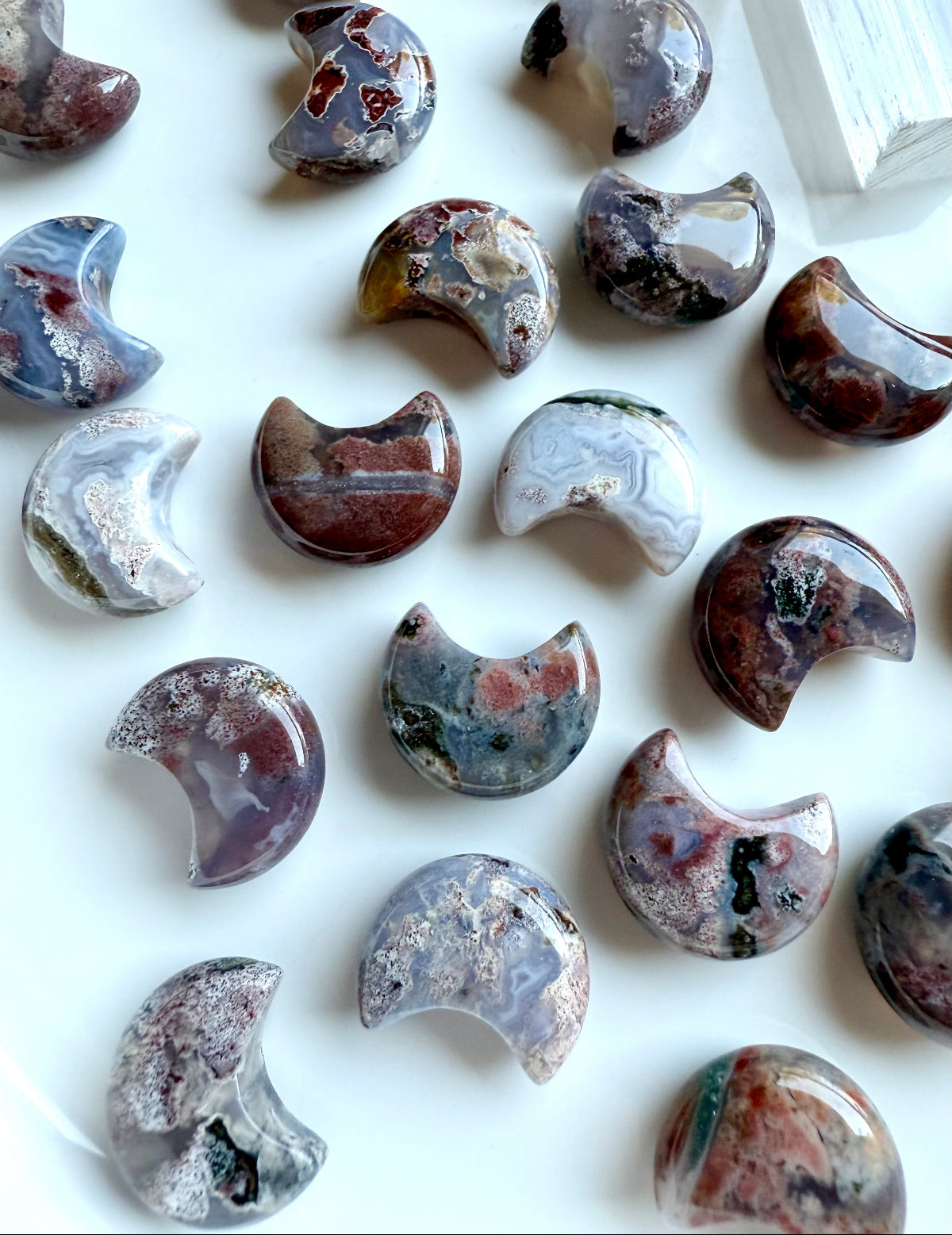 Ocean Jasper crystal collection featuring polished Ocean Jasper moon carvings for grounding, clarity, and emotional balance
